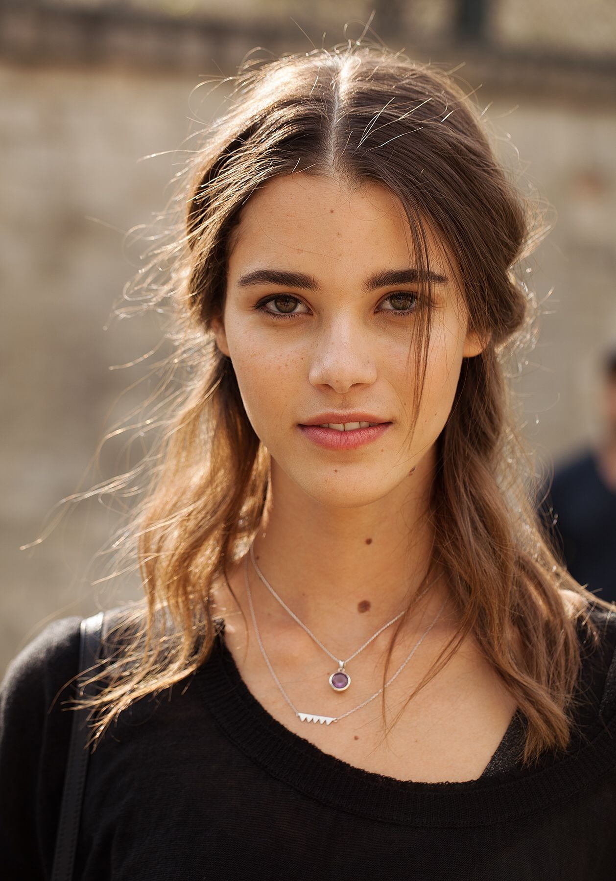 Pauline Hoarau, brown eyes, looking at viewer, face, Black top, model, birthmark, portrait display, 720P, women, brunette, long hair, necklace, Phone HD Wallpaper
