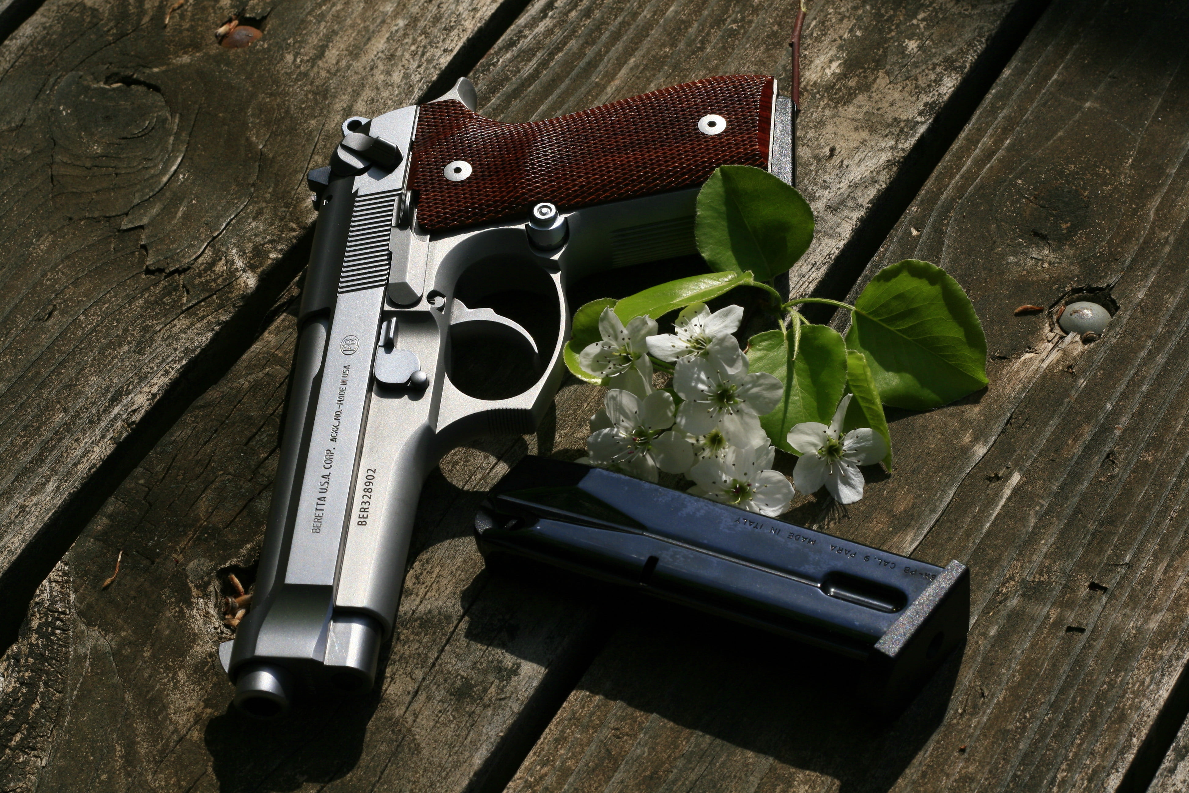 wood - material, handgun, pistol, growth, gun, high angle view, 4K, leaf, table, ammunition, indoors, still life, plant, automatic, Beretta, no people, HD Wallpaper