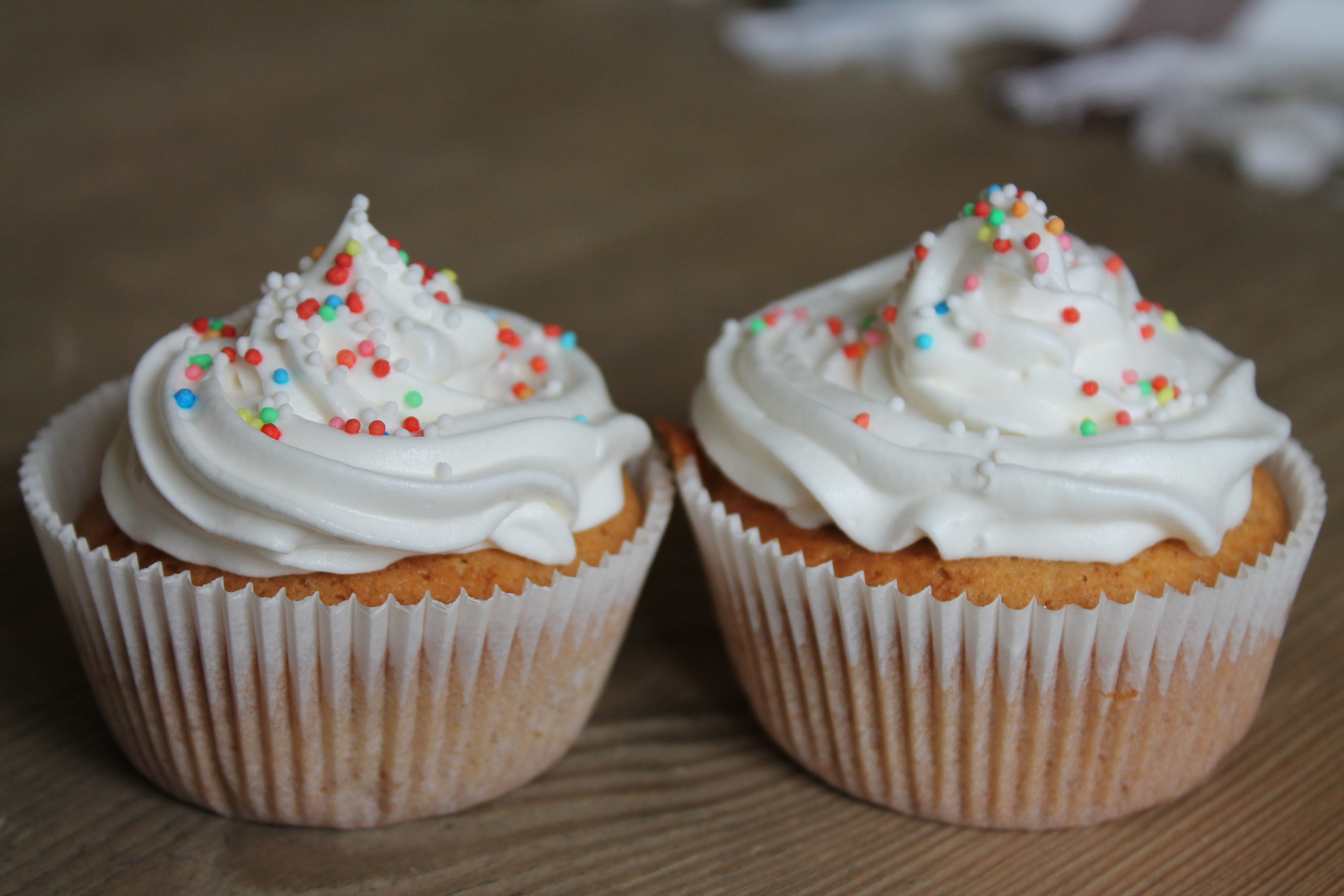 cupcake holder, sweet food, unhealthy eating, freshness, 4K, close-up, still life, temptation, table, food and drink, indoors, food, icing, baked, cupcake, HD Wallpaper