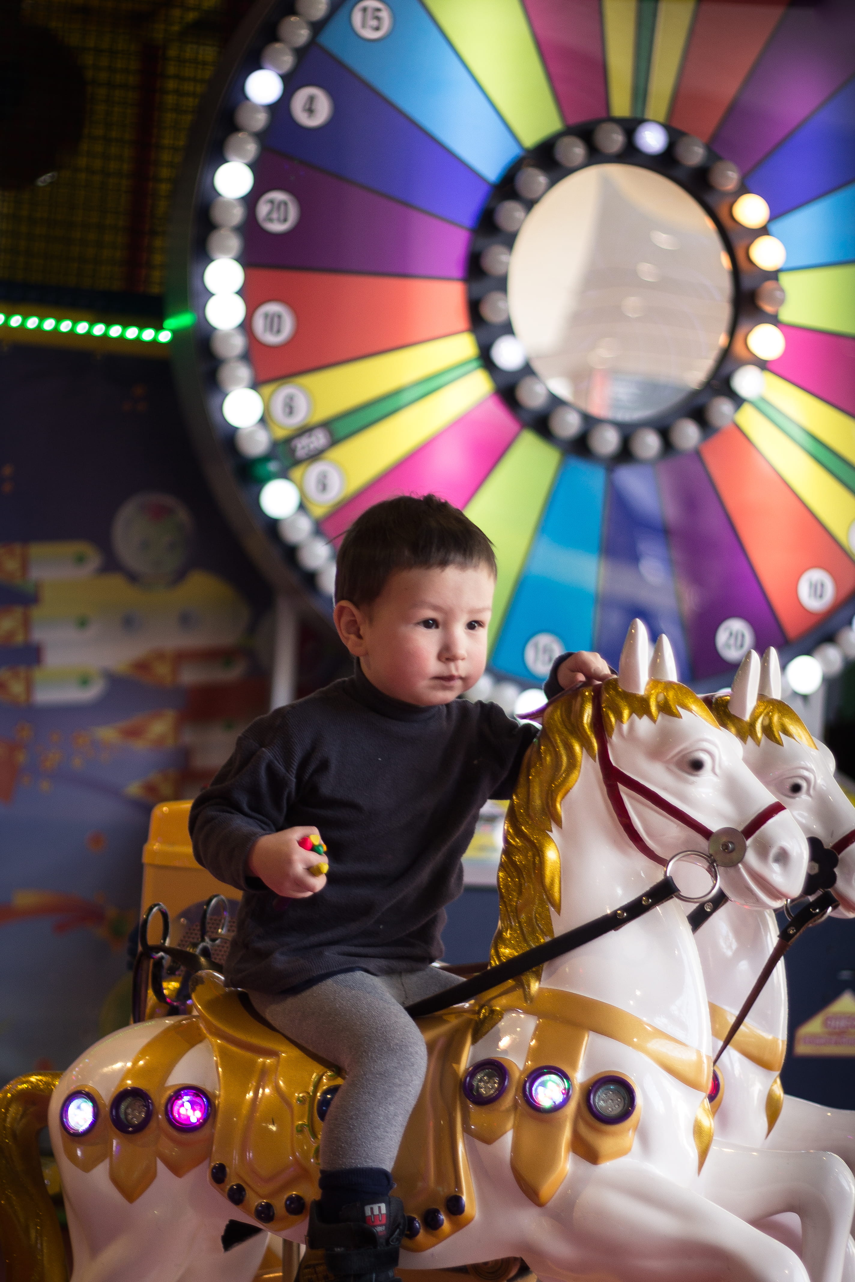 lighting, men, game, cute, real people, leisure activity, carousel, boy, childhood, horse, child, kid, human, boys, entertainment, enjoyment, animal, multi colored, Phone HD Wallpaper