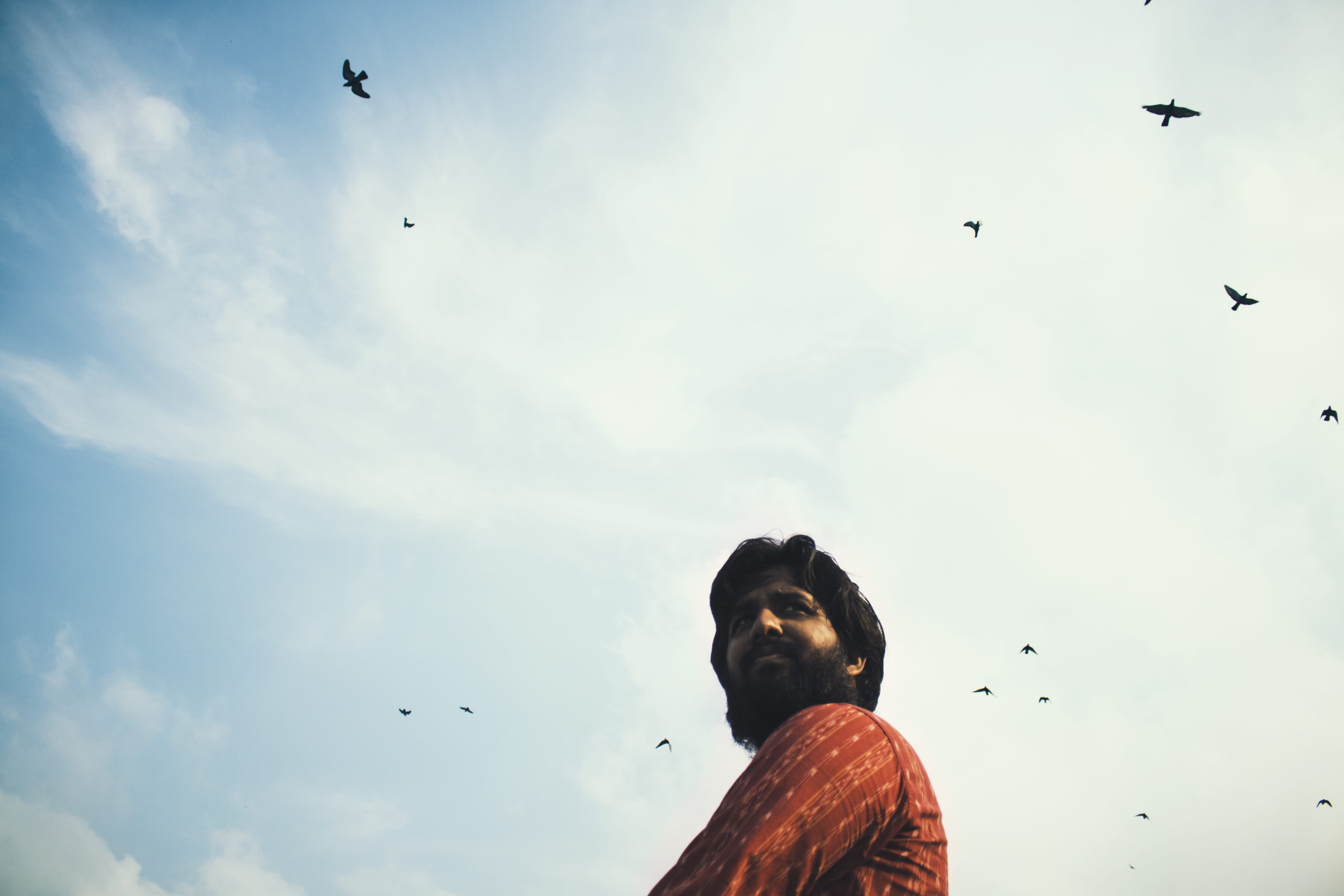 outdoor, lifestyles, sky, kid, mumbai, day, headshot, one person, outside, cloud - sky, red, pigeon, shoreline, bird, cloudy, outdoors, beard, mid-air, HD Wallpaper
