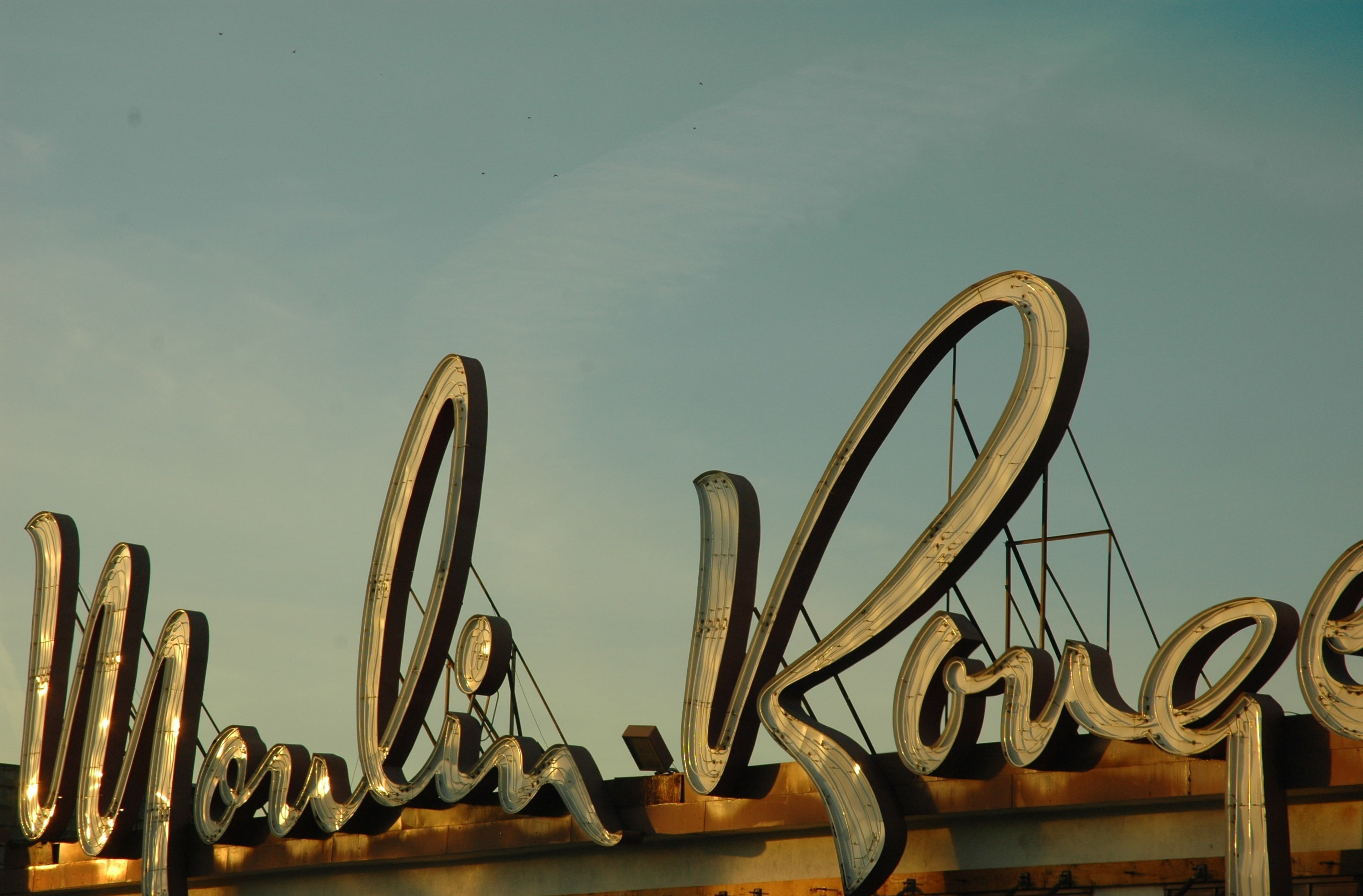 western script, sculpture, clear sky, moulin, built structure, architecture, day, 2K, Vintage, low angle view, sky, water, text, no people, design, Moulin Rouge, HD Wallpaper