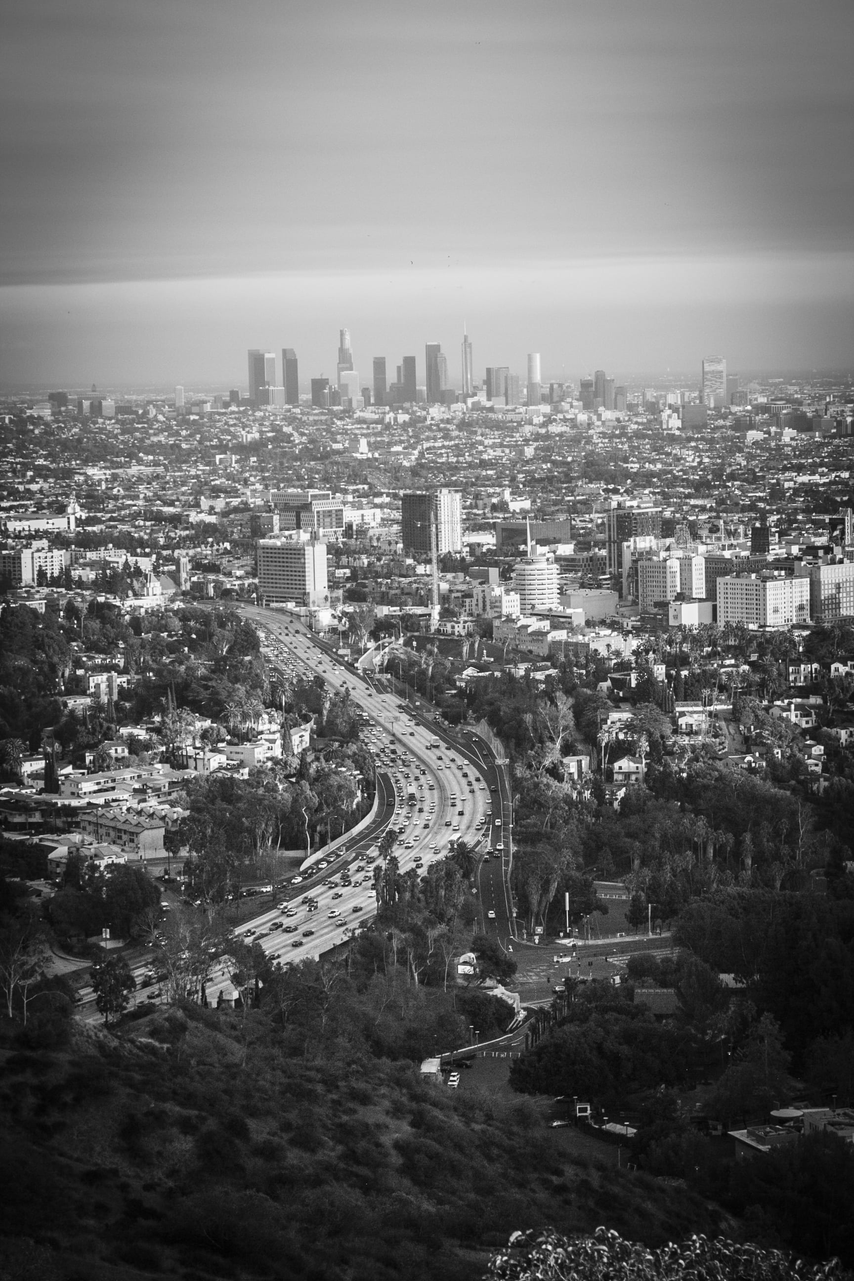 aerial, photo, outdoors, skyline, tree, daytime, office building exterior, cityscape, building exterior, travel destinations, skyscraper, sky, multiple lane highway, Phone HD Wallpaper