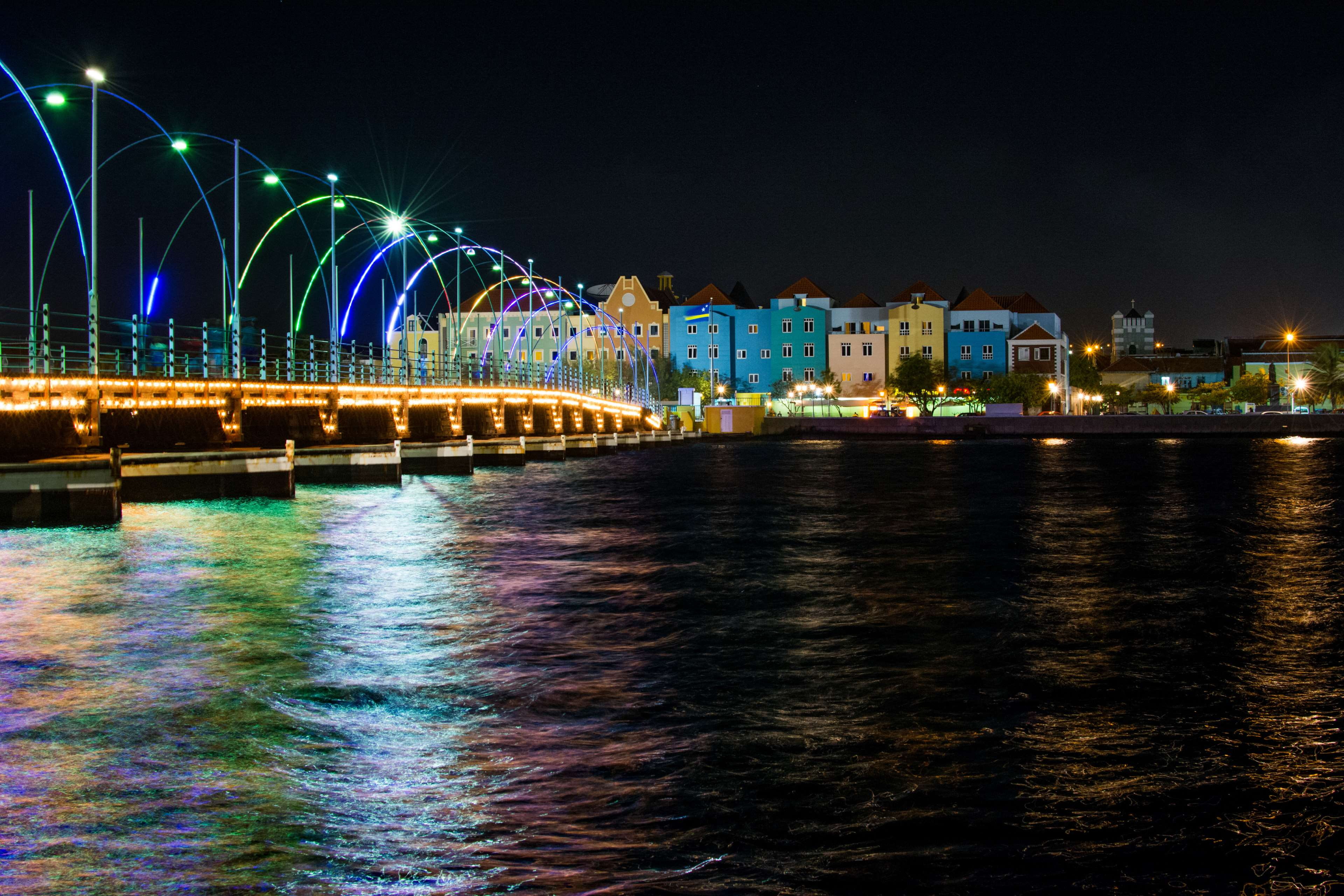cityscape, water, arch bridge, night, bridge - man made structure, nightlife, illuminated, buildings, queen emma bridge, light, no people, architecture, HD Wallpaper
