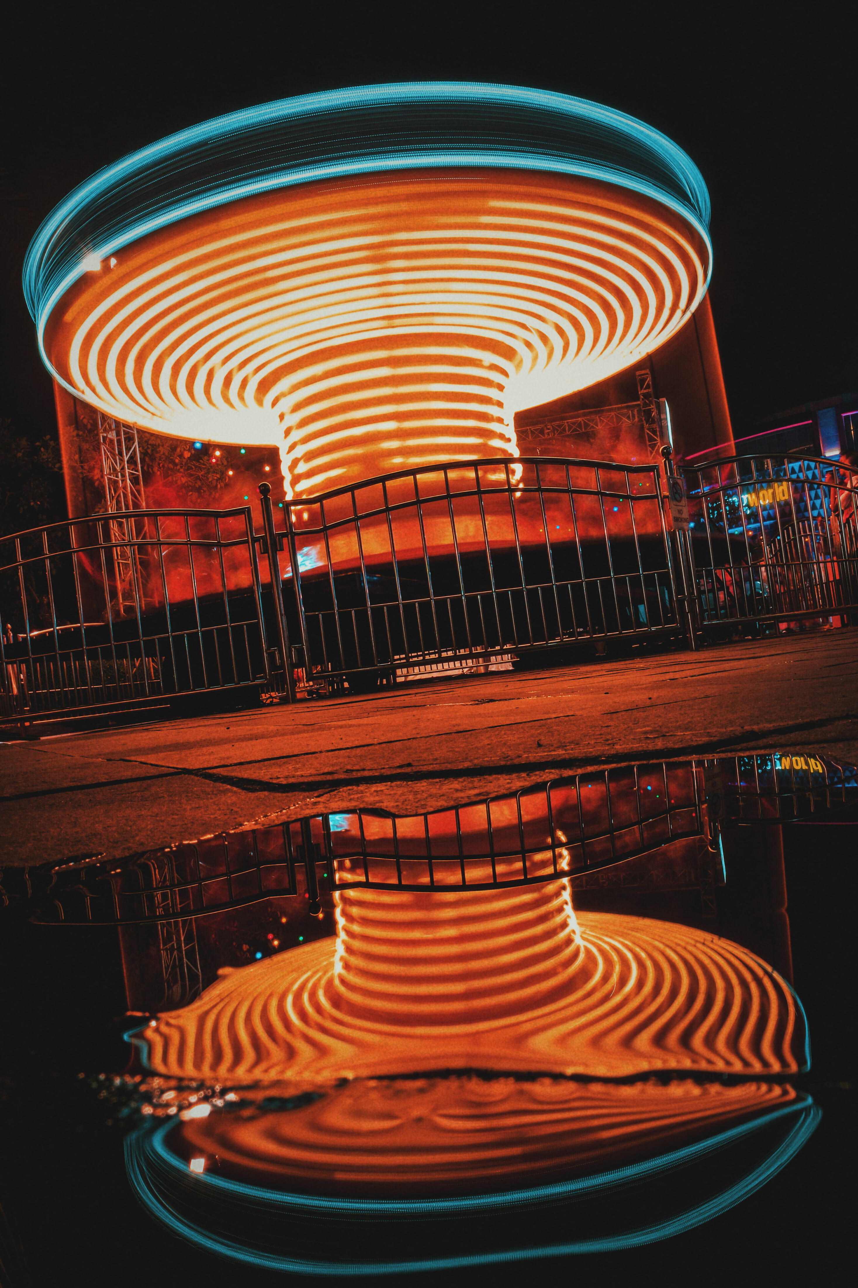 orange color, long exposure, architecture, fountain, pattern, arts culture and entertainment, glowing, red, no people, multi colored, spinning, light trail, Phone HD Wallpaper