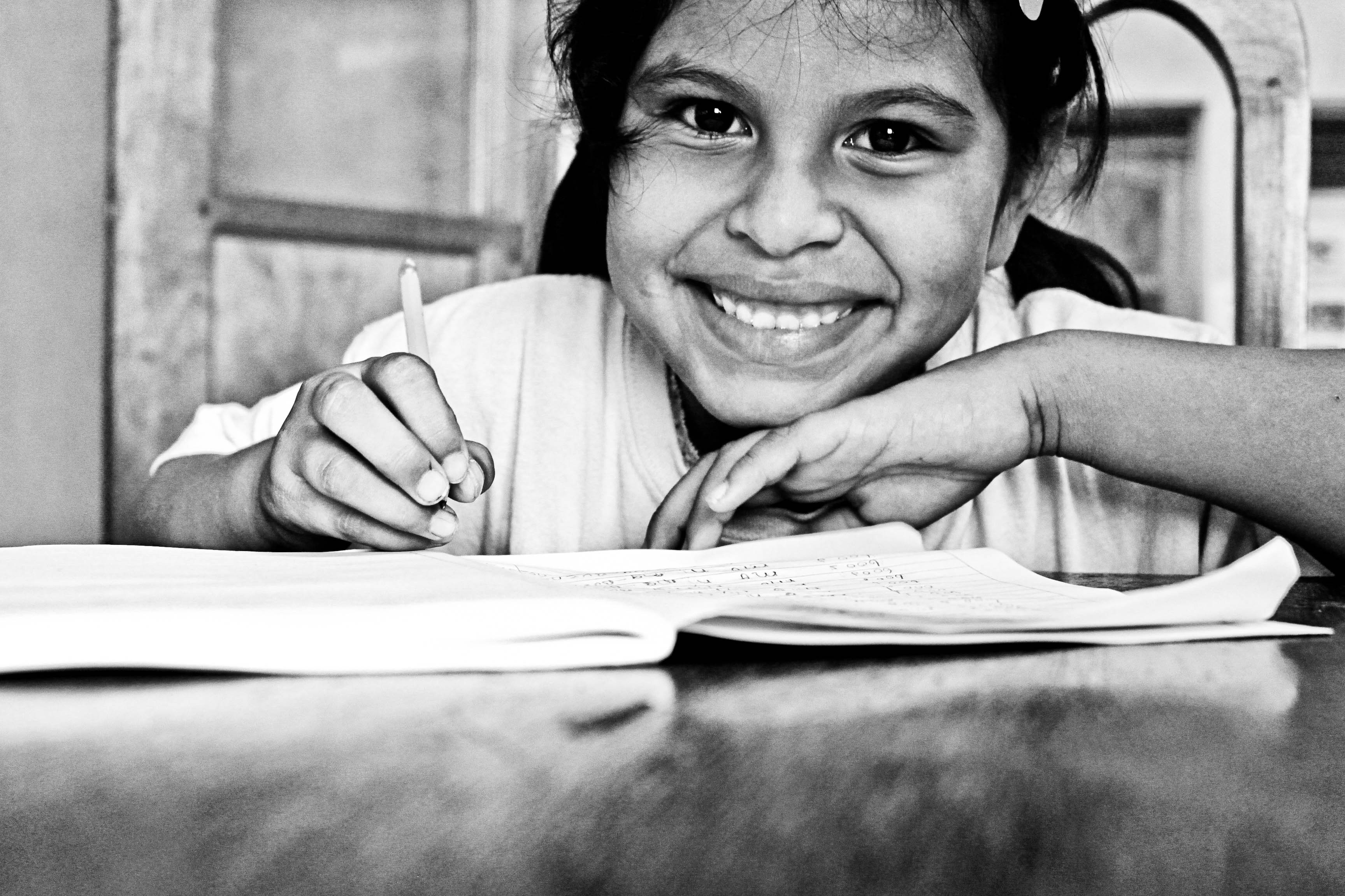 studying, youth, pupil, emotion, holding, study, toothy smile, school class, teeth, front view, learn, elementary, classroom, learning, smiling, 2K, table, HD Wallpaper