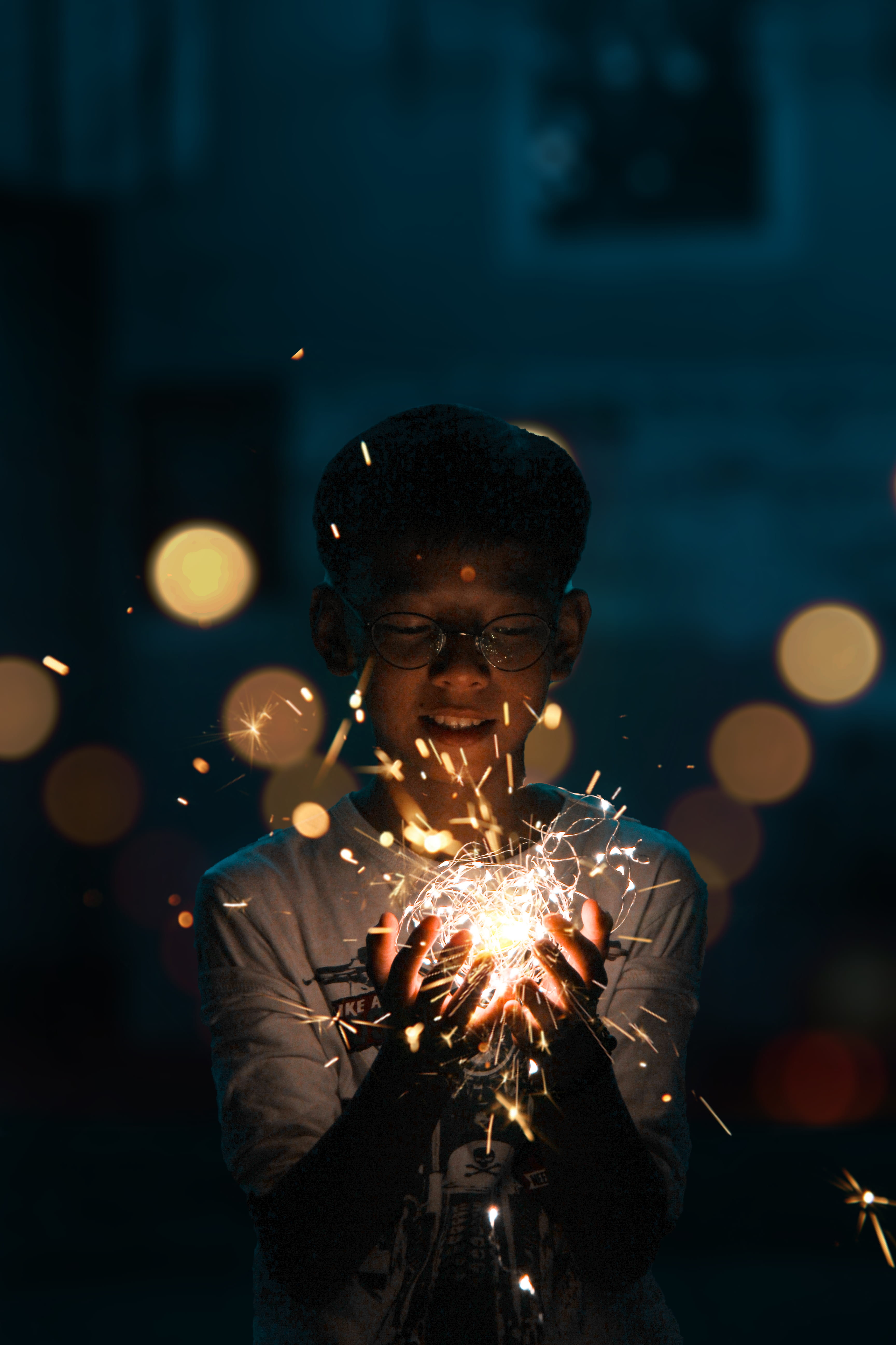 sparkler, glowing, motion, illuminated, lifestyles, boy, burning, leisure activity, one person, crackers, sparks, focus on foreground, waist up, males, Phone HD Wallpaper