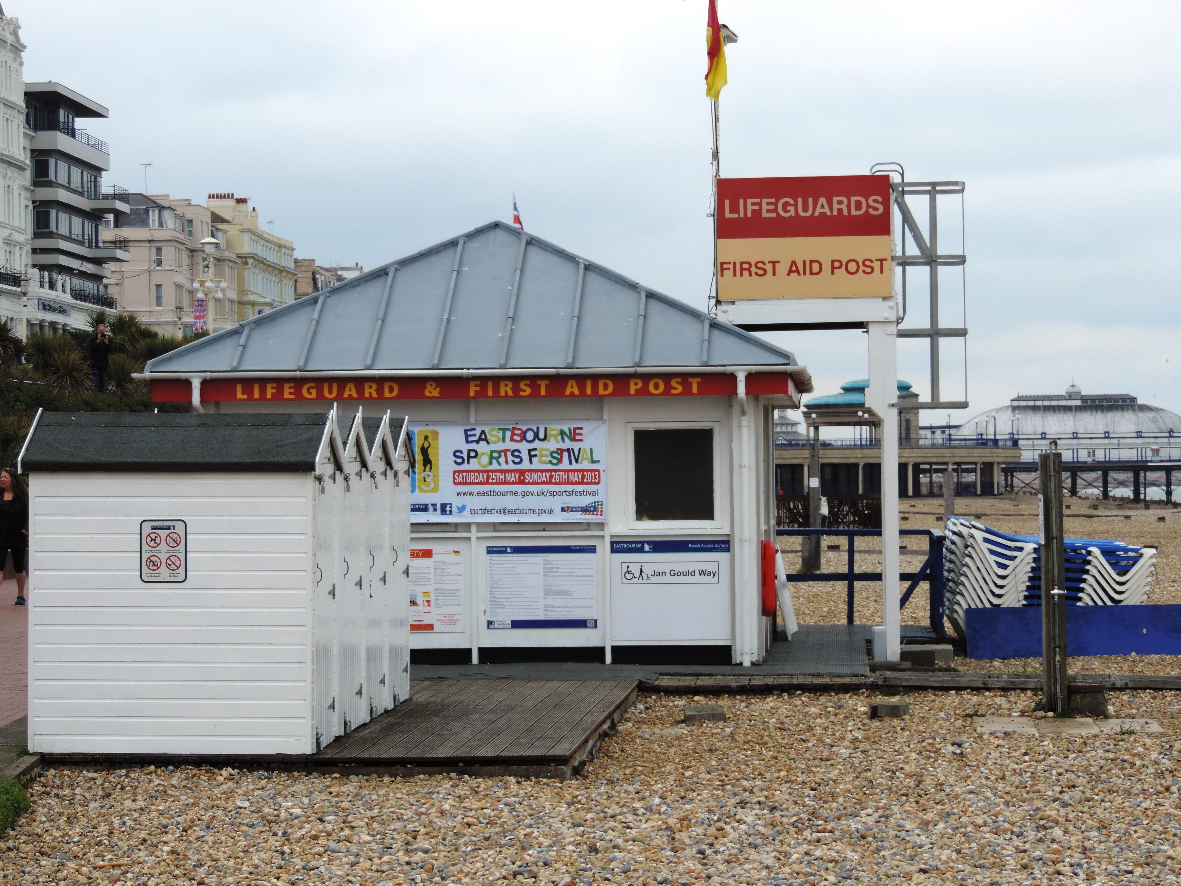 building, sign, east sussex, flag, western script, built structure, coastline, no people, sky, lifeguard, building exterior, nature, information sign, text, HD Wallpaper
