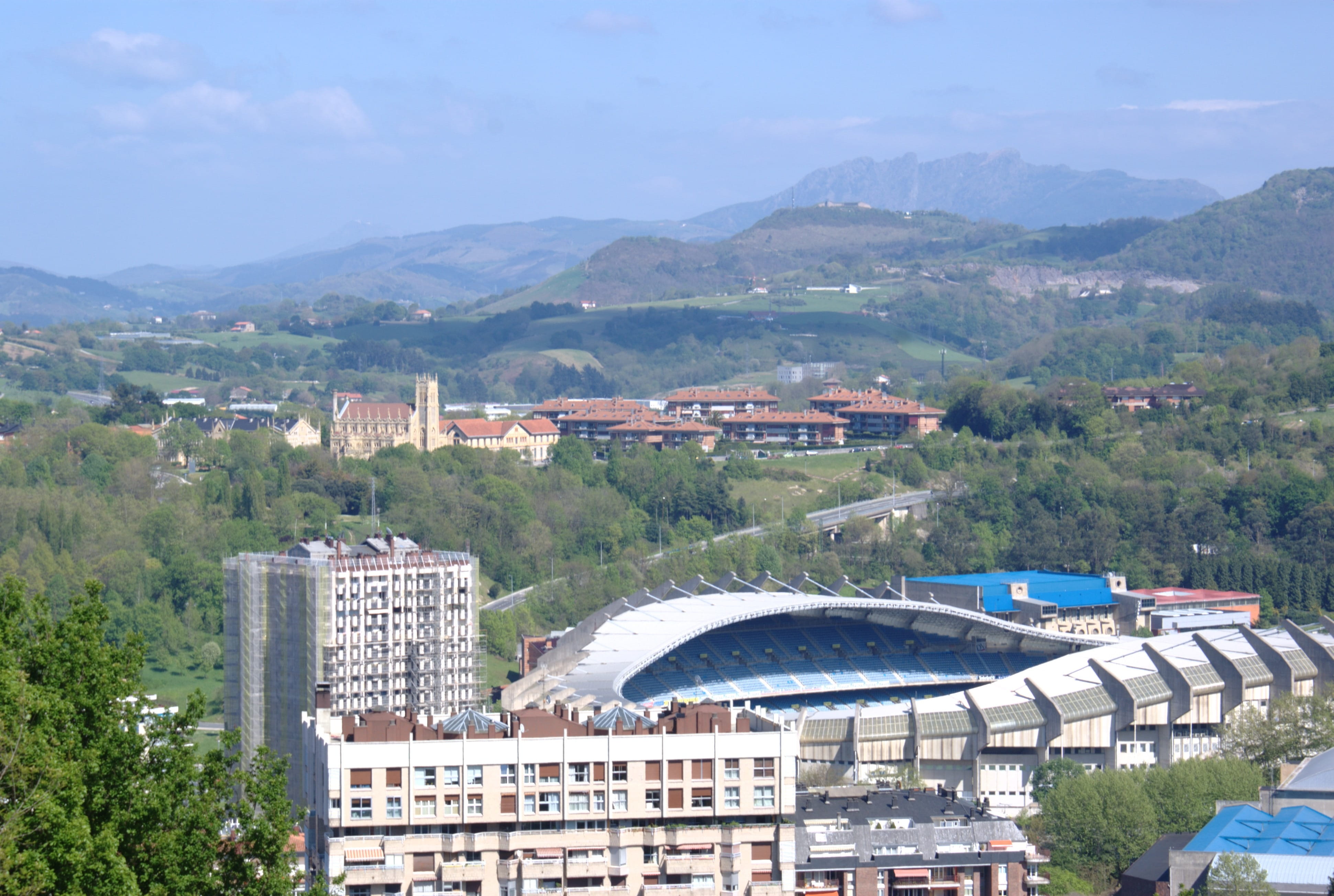 urban Scene, sky, transportation, nature, beauty in nature, San Sebastian, 4K, mountain range, mountain, connection, city, plant, built Structure, building exterior, HD Wallpaper