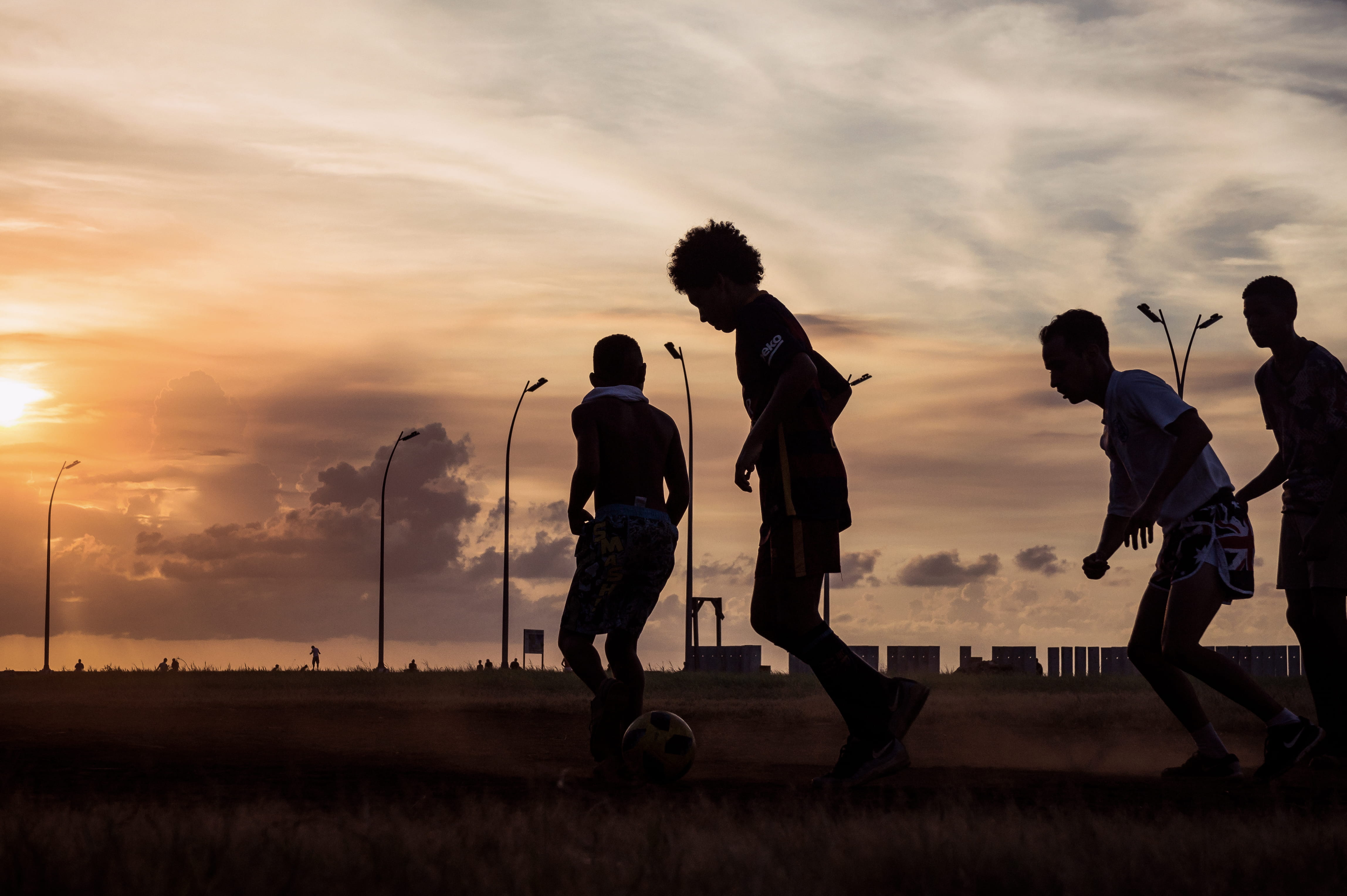 4K, kids, land, 2018, soccer, people, togetherness, friendship, silhouette, group of people, sport, nature, malecon, orange color, cloud - sky, leisure activity, HD Wallpaper