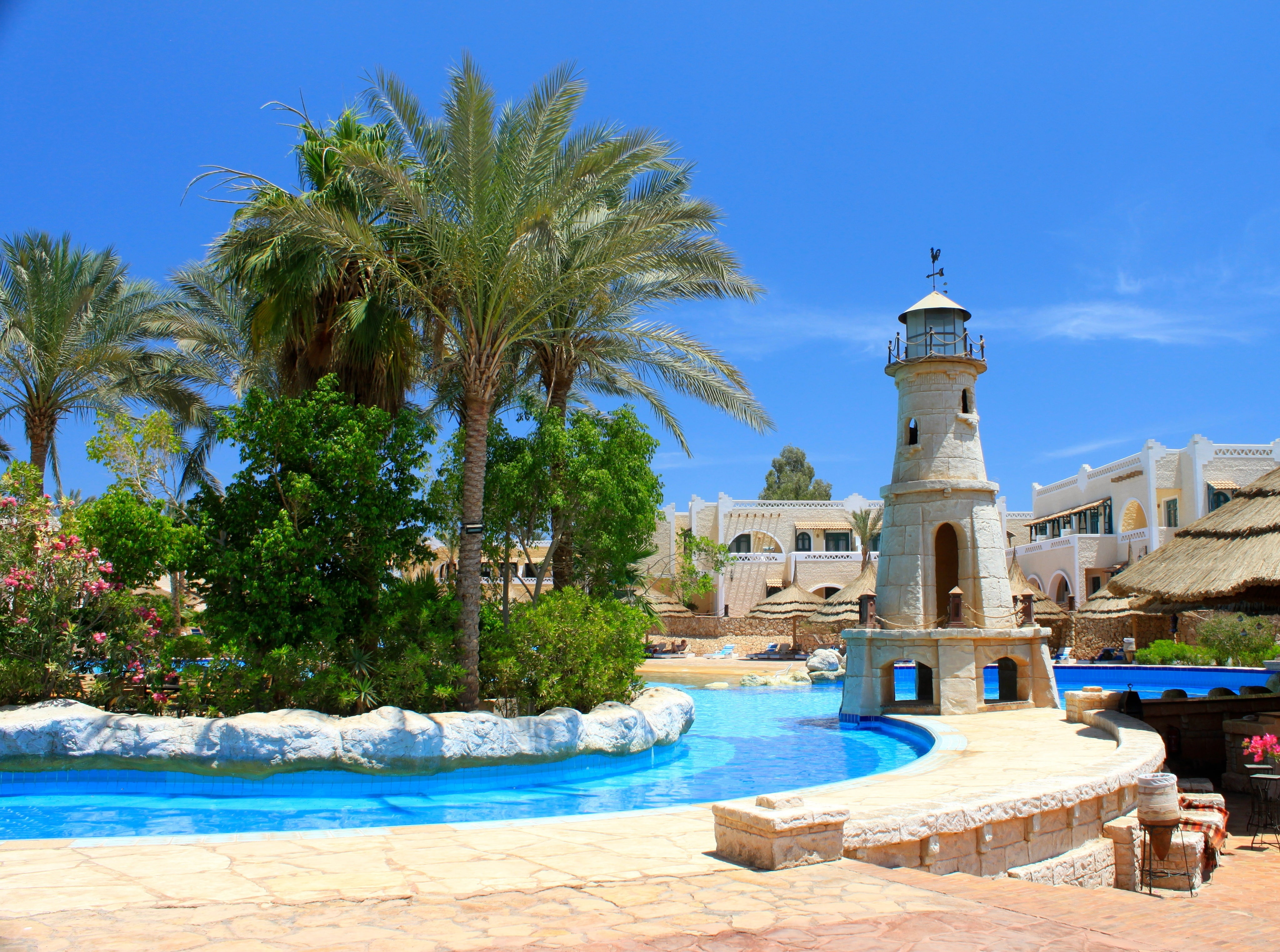palm, travel destinations, Hotel, architecture, water, Pool, Egypt, blue, tropical climate, sunlight, 4K, tree, building, lighthouse, near, sky, white, HD Wallpaper