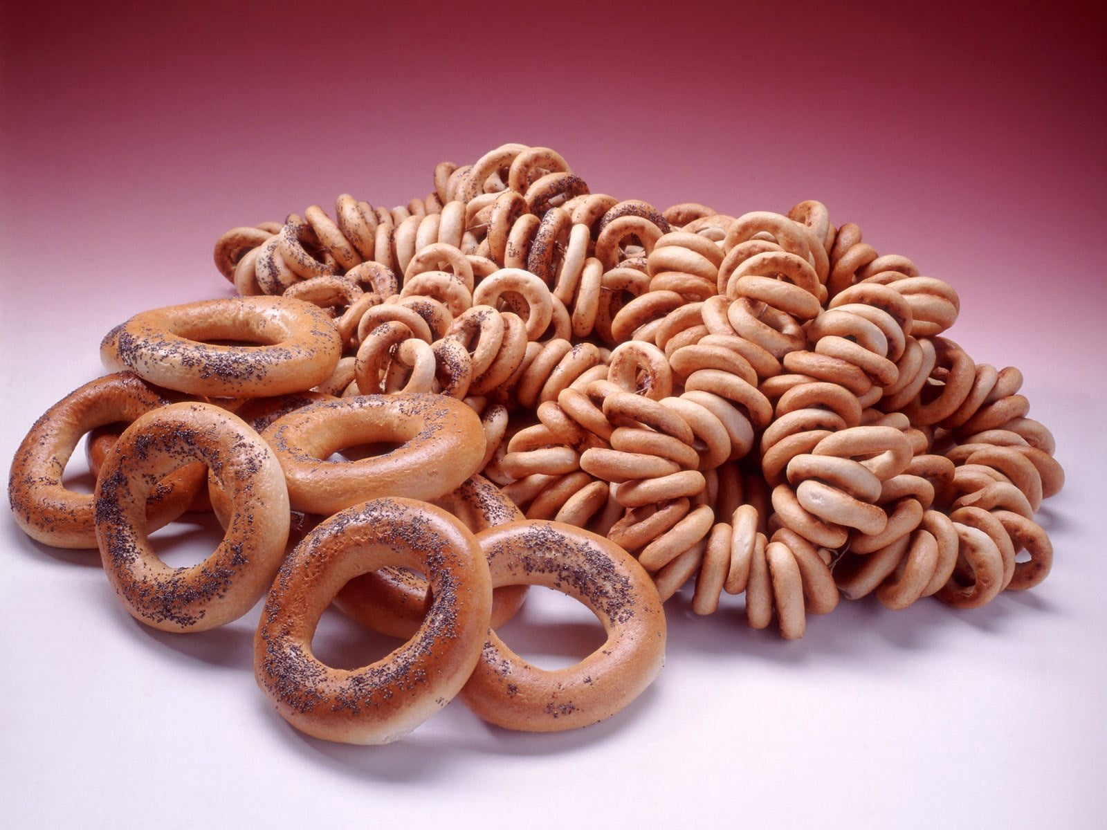 pretzel, no people, drying, heap, freshness, colored background, pile, 720P, close-up, salted, still life, doughnuts, wellbeing, poppy, studio shot, large group of objects, HD Wallpaper