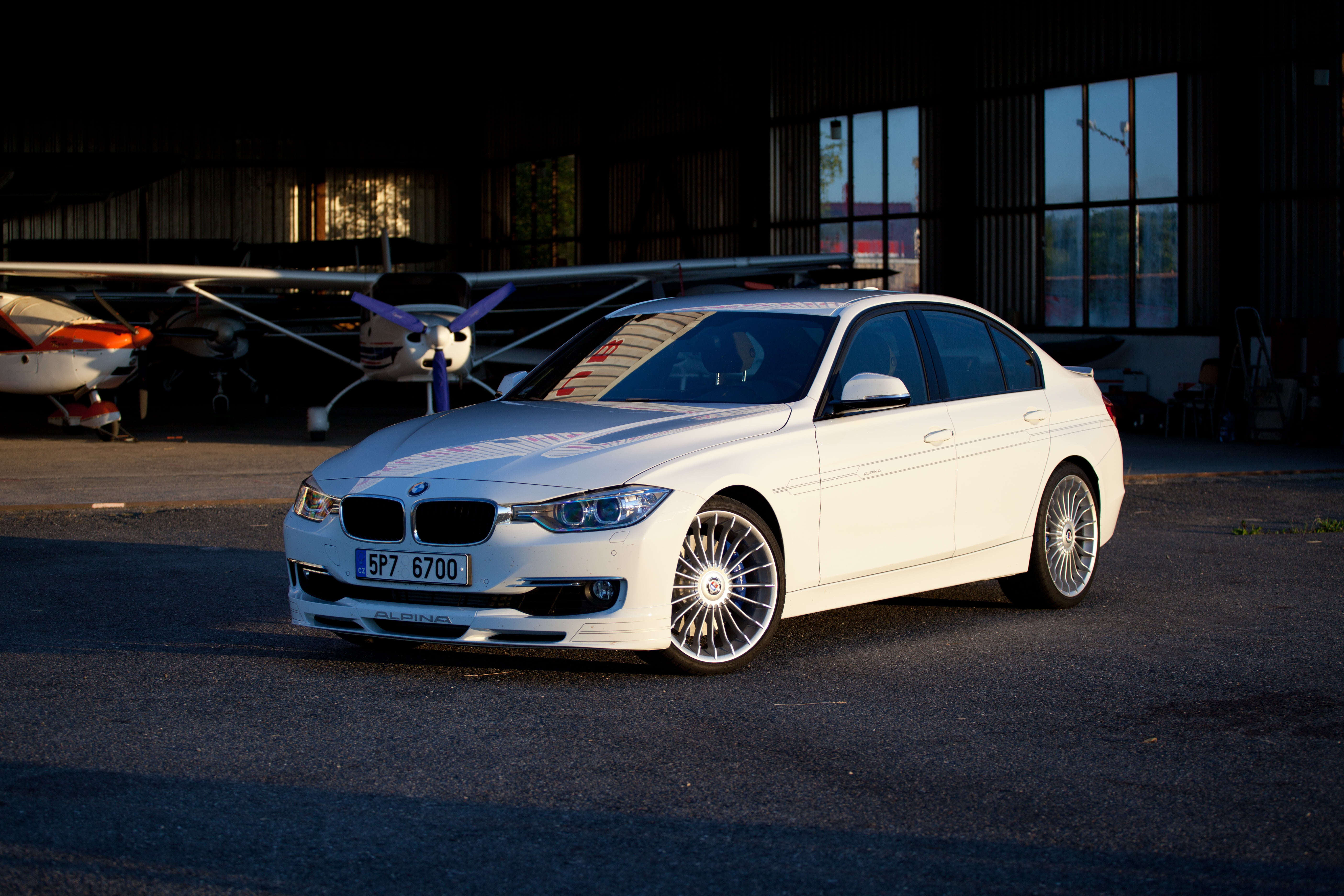 one person, day, White, street, 5K, luxury, Alpina, road, architecture, real people, Biturbo, built structure, mode of transportation, city, sunlight, HD Wallpaper