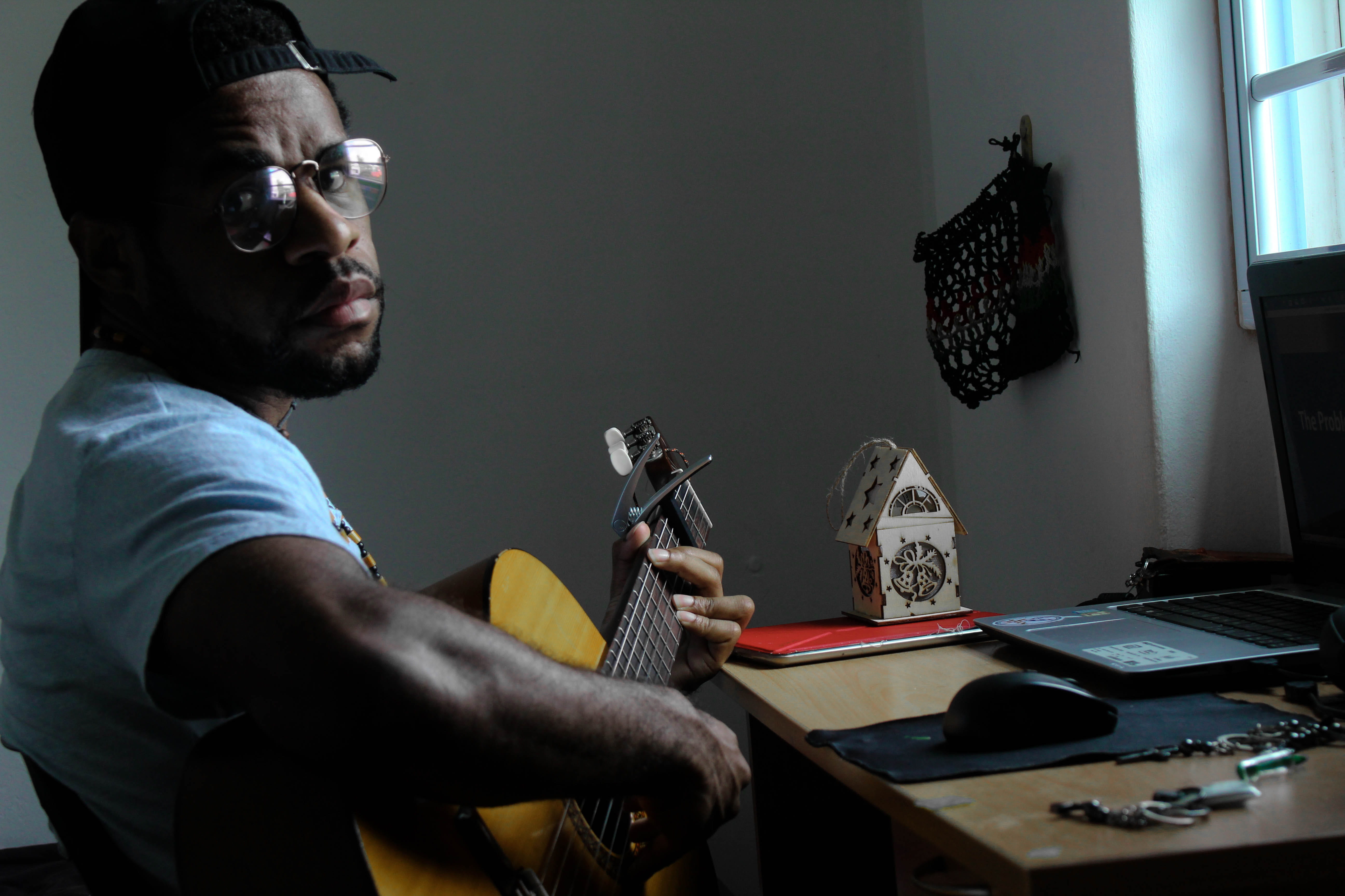 indoors, brown, 5K, musician, room, creativity, look, laptop, men, beard, one person, holding, social issues, sitting, desk, portrait, cap, instrument, HD Wallpaper