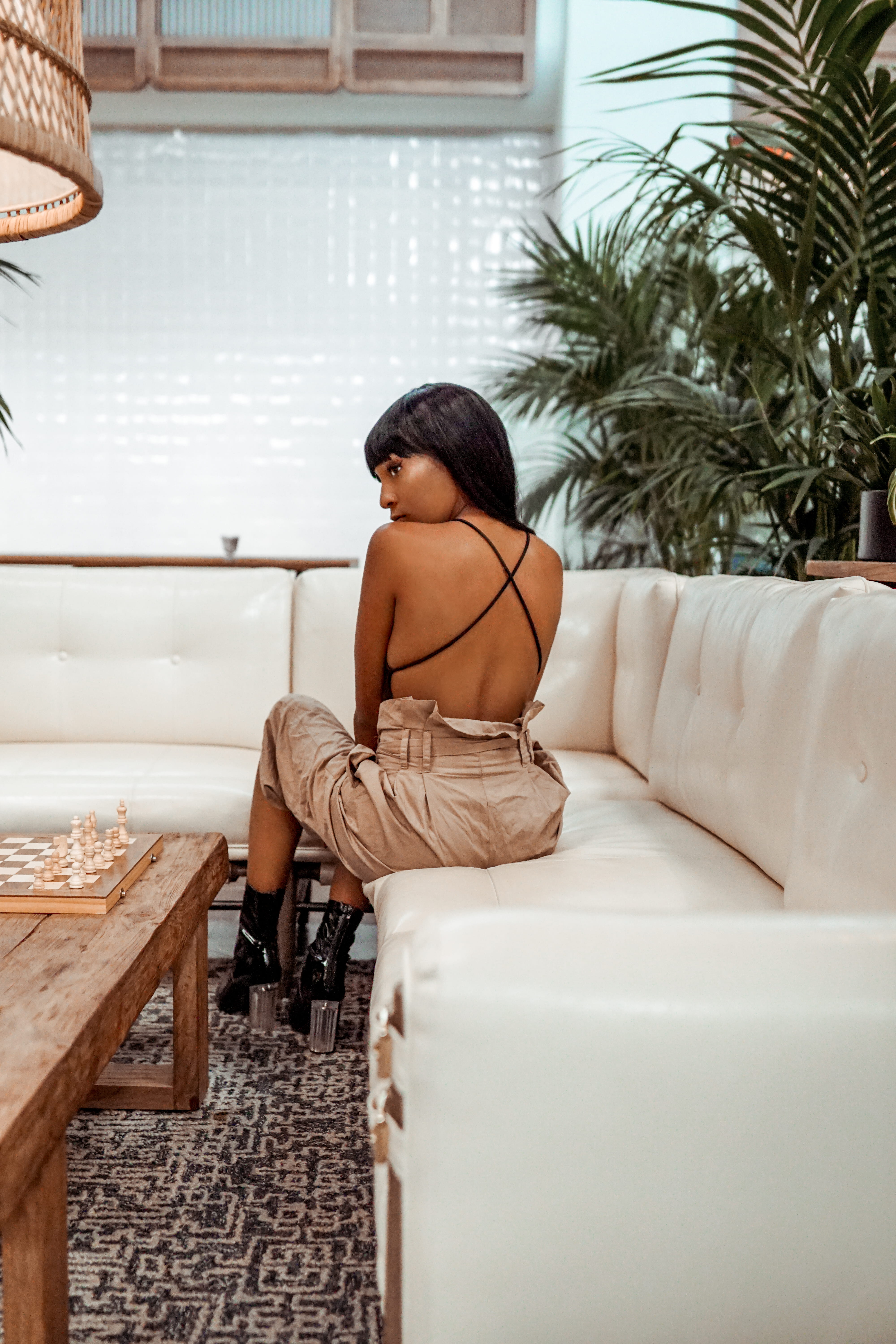 women, beautiful, femme, style, plant, leisure Activity, female, one Young Woman Only, chair, relaxation, african Ethnicity, editorial, one Person, sofa, Phone HD Wallpaper