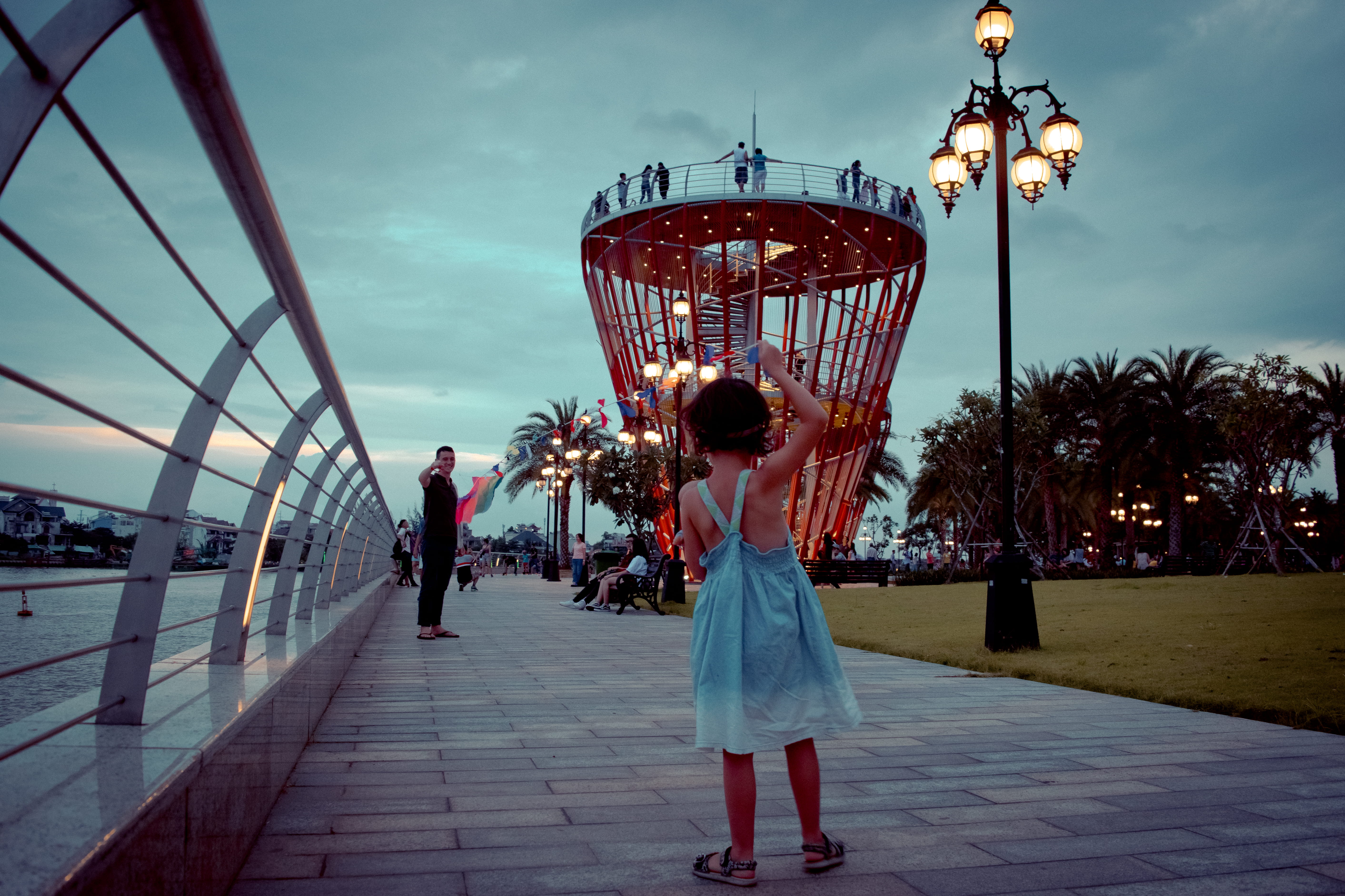 incidental people, rear view, playing, built structure, lighting equipment, daughter, leisure activity, sunset, nature, illuminated, full length, father, HD Wallpaper