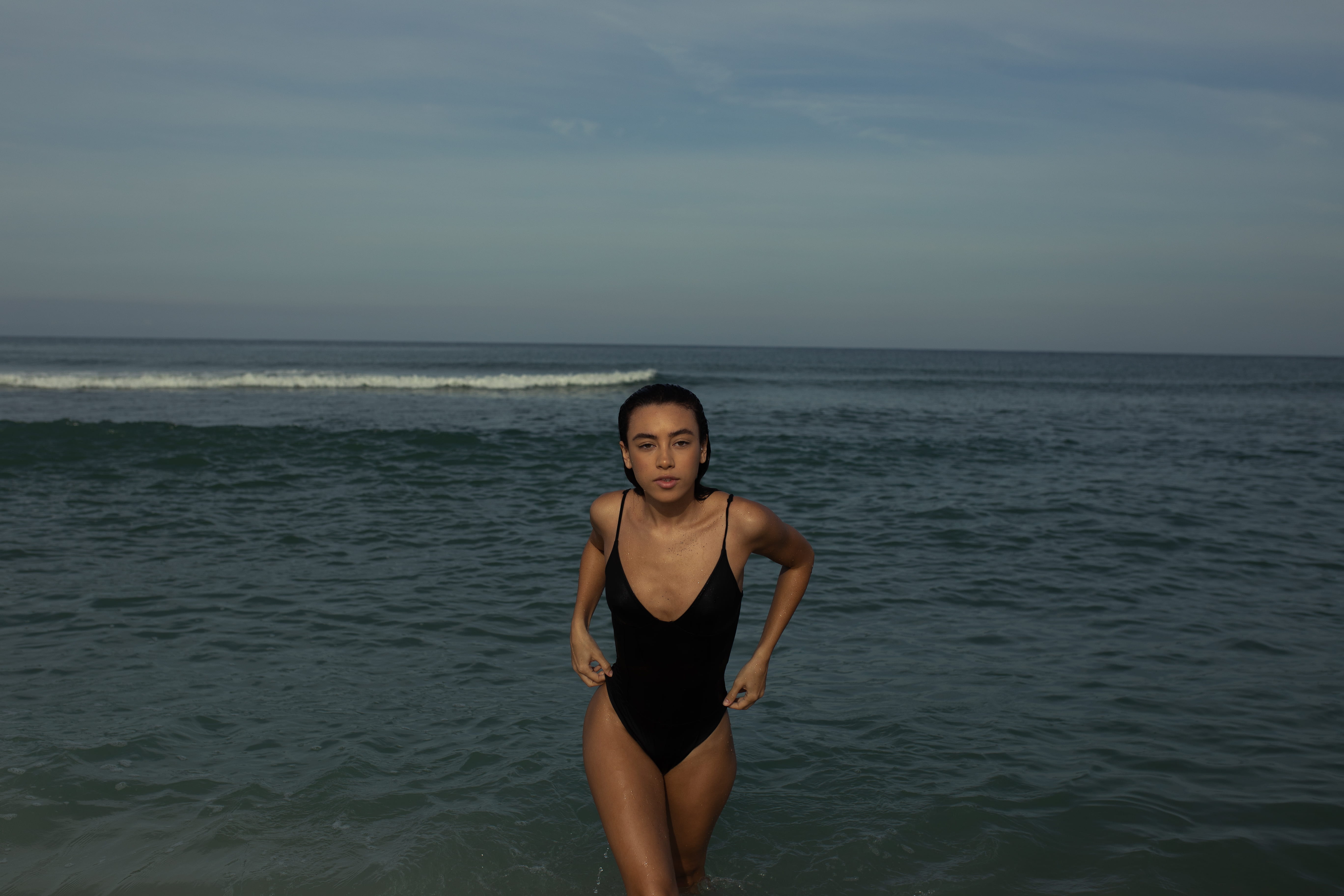 swimsuit, sea, three quarter length, one person, outdoors, sky, outdoor, leisure activity, scenics - nature, black, woman, walking, dark, lifestyles, ocean, HD Wallpaper