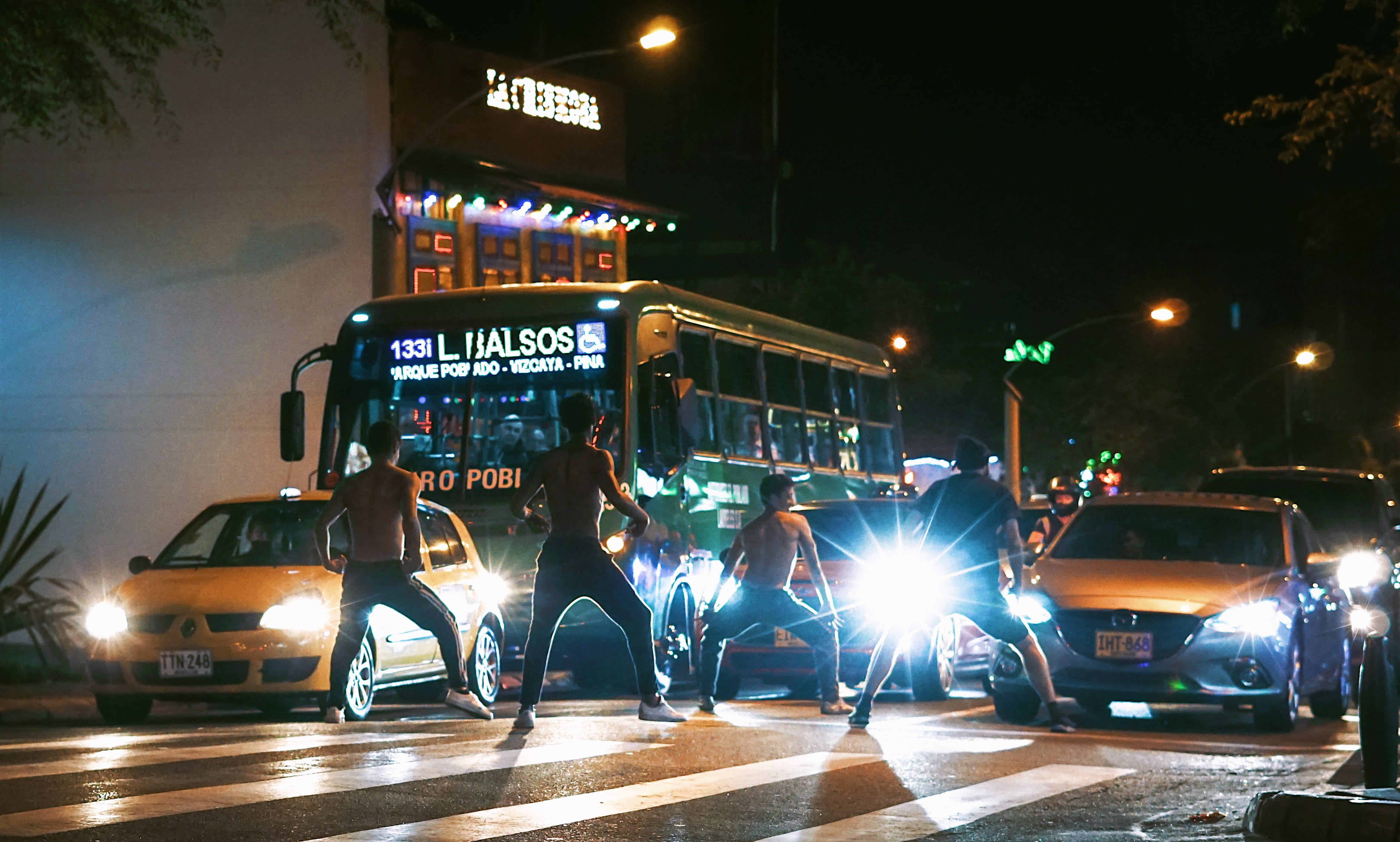 architecture, light, city, machine, mode of transportation, land vehicle, women, person, motor vehicle, men, road, text, outdoors, tour bus, illuminated, HD Wallpaper
