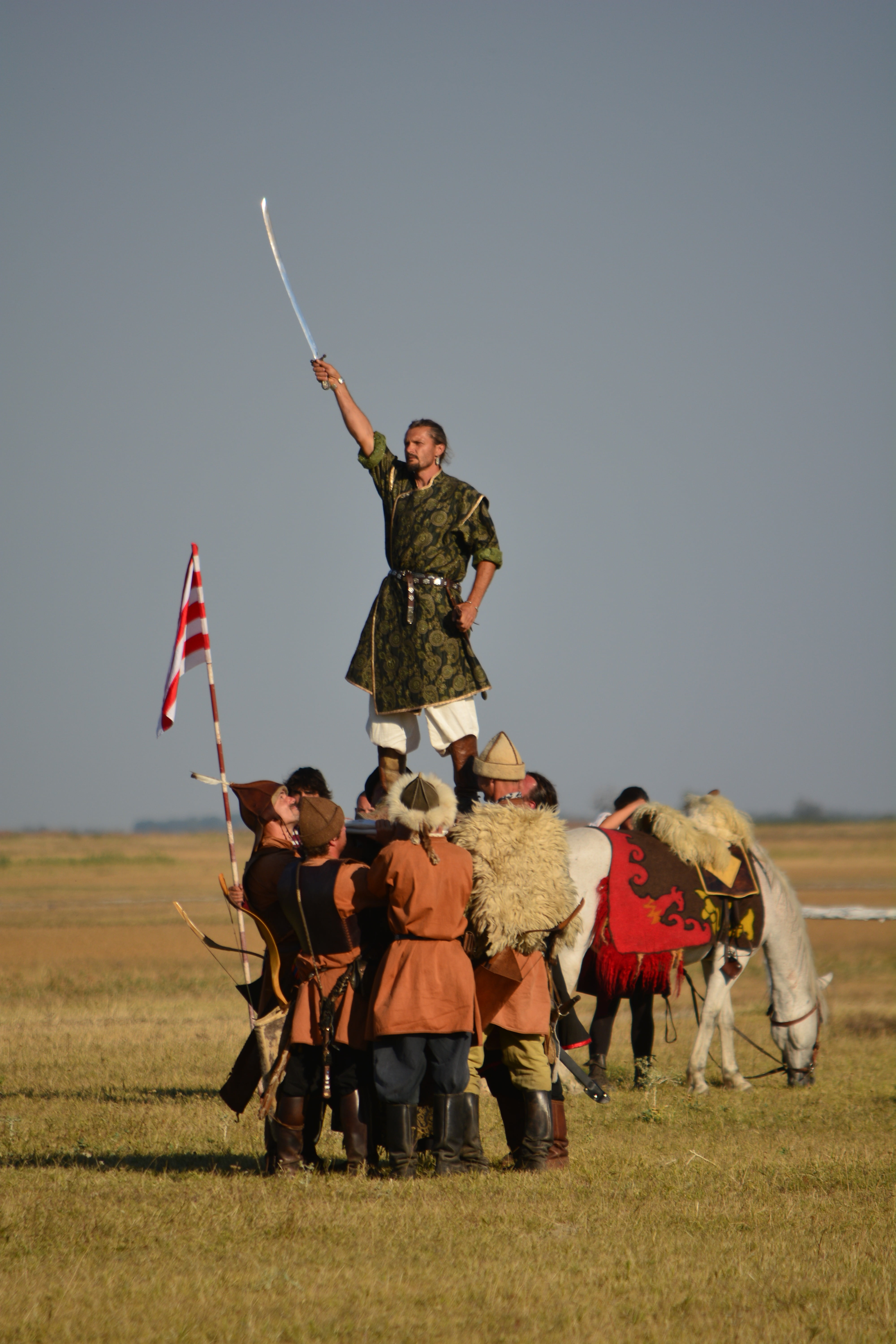 leisure activity, sword, field, standing, history, hungarian, flag, 5K, sitting, people, sky, full length, leader, land, nature, armed Forces, men, holding, Phone HD Wallpaper