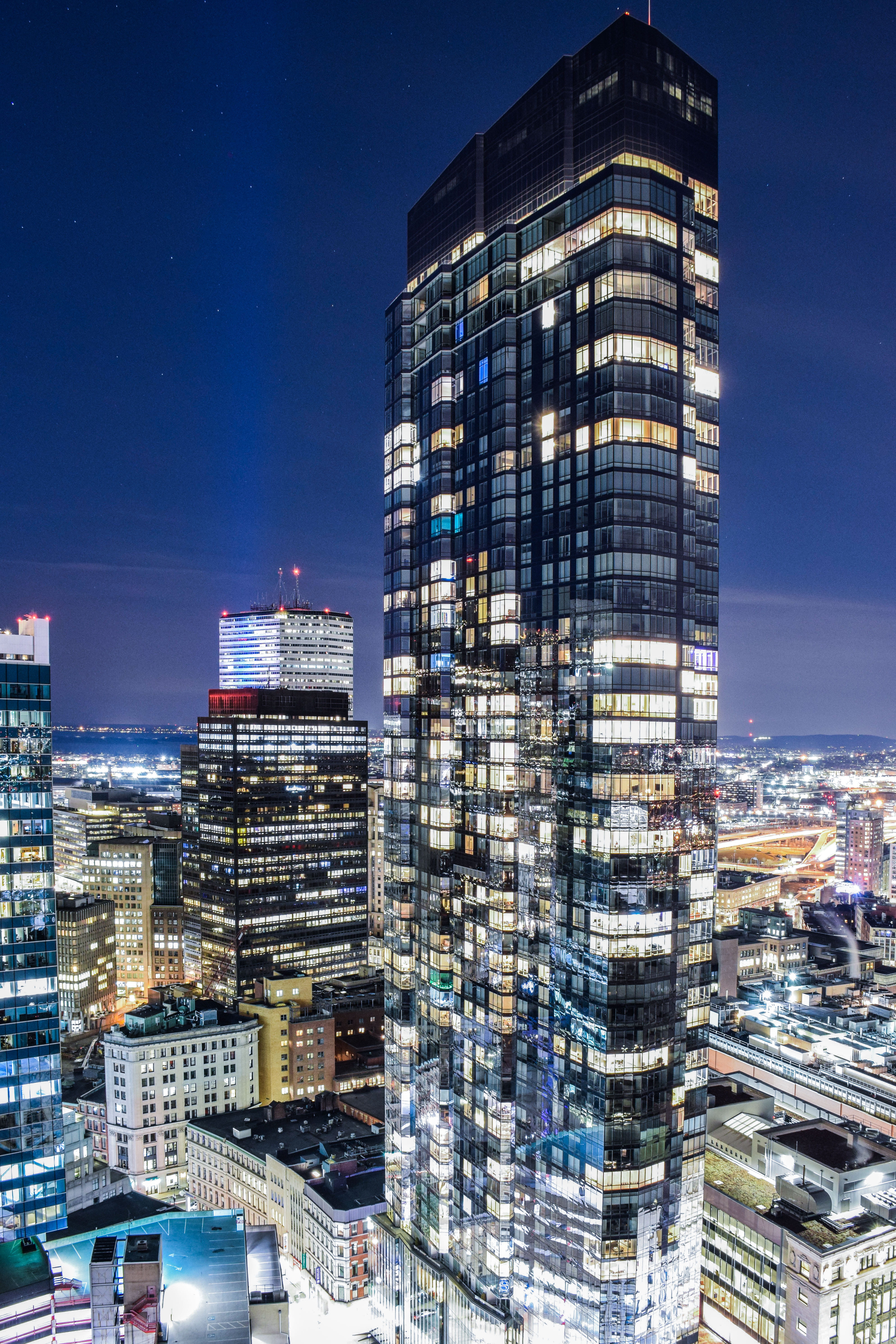 outdoors, apartment, built structure, skyscraper, city, blue, illuminated, architecture, cityscape, aerial, buidings, building exterior, clear, night, 5K, Phone HD Wallpaper