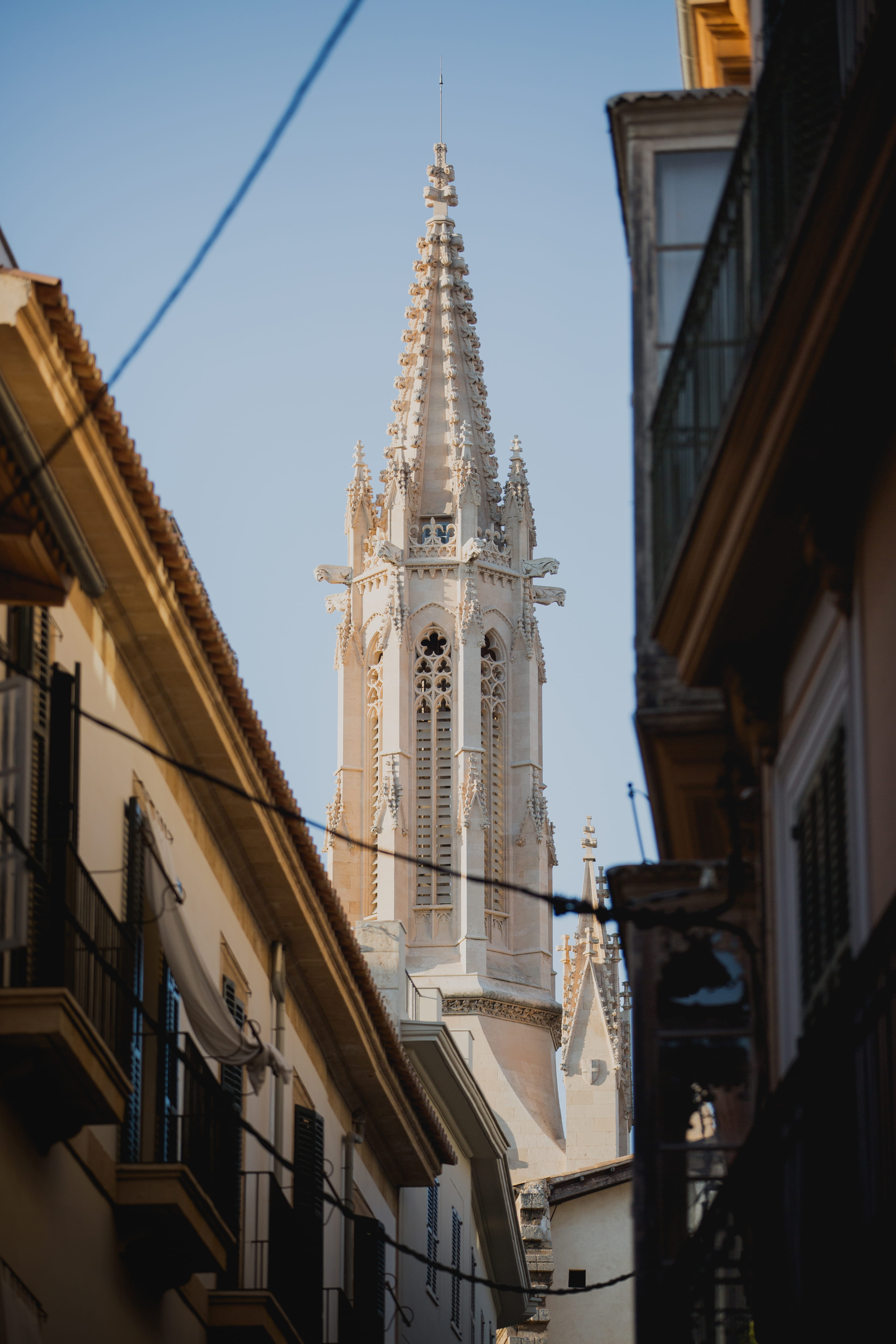 cathedral, belief, low angle view, architecture, sky, no people, church, 5K, place of worship, built structure, clock, city, day, spire, skyline, gothic style, Phone HD Wallpaper