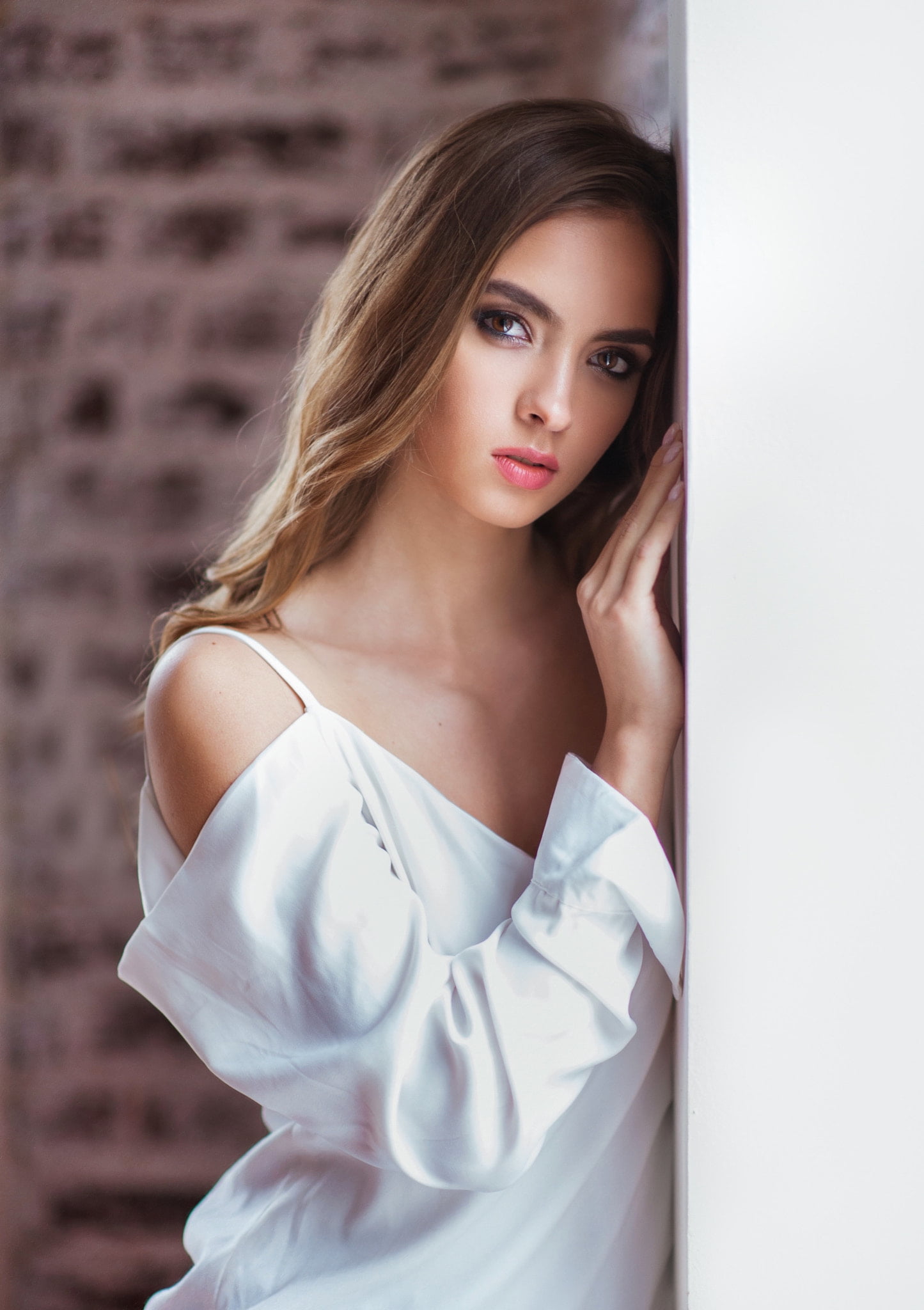 wavy hair, brunette, long hair, Maxim Maximov, wall, blouse, Victoria Lukina, lipstick, white clothing, looking at viewer, makeup, eyeliner, women, 1080P, Phone HD Wallpaper