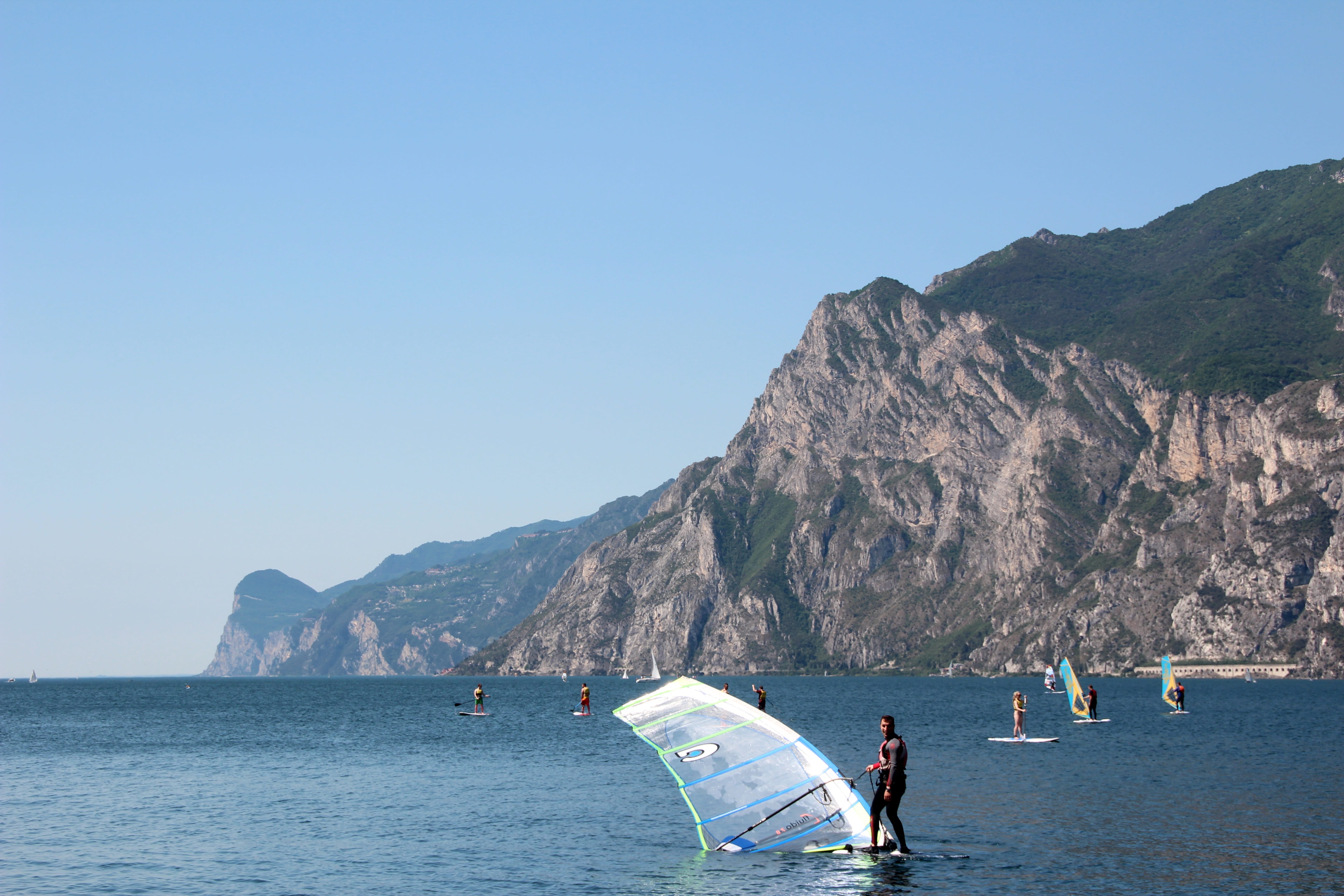 transportation, scenics - nature, water sports, mountain, surfer, nautical vessel, sailboat, landscape, water, lake, clear sky, stand up paddle, sea, rock, HD Wallpaper