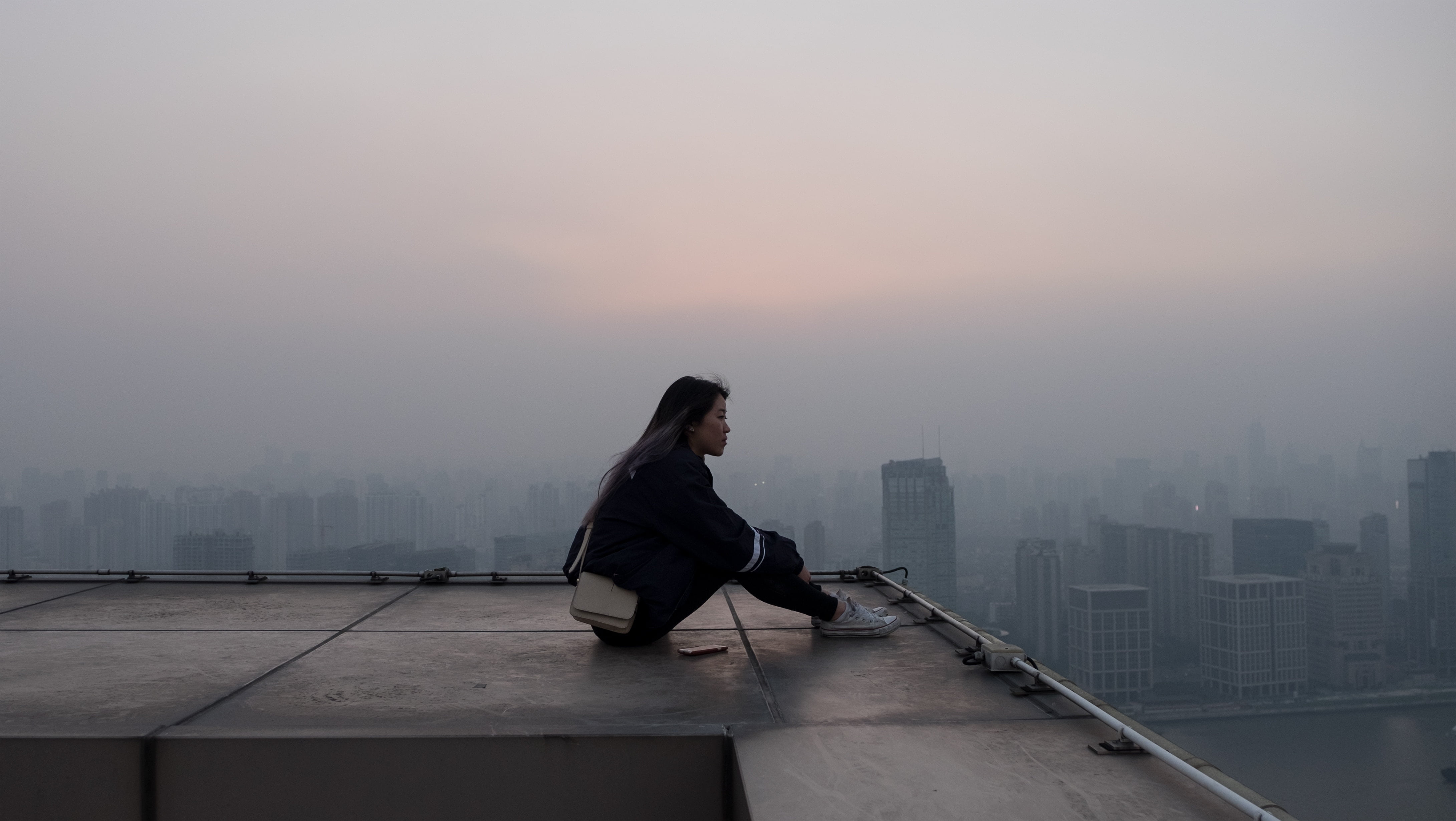 full length, mist, city, built structure, photography, real people, fog, cityscape, skyscraper, adult, side view, women, lifestyles, sky, rooftops, Asian, HD Wallpaper