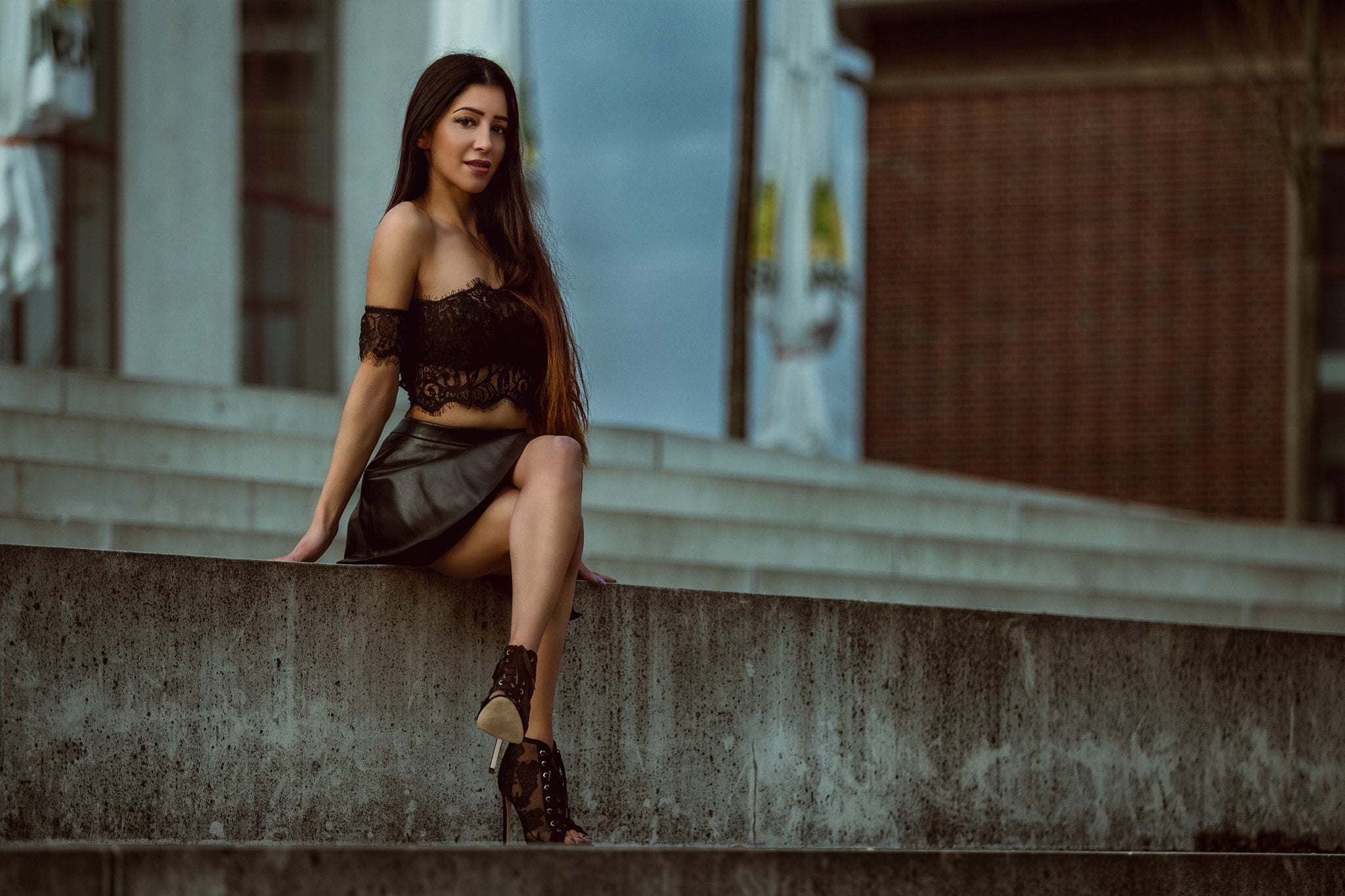tanned, long hair, young women, women, fashion, depth of field, hairstyle, one person, outdoors, sitting, brown hair, skirt, young adult, beautiful people, HD Wallpaper