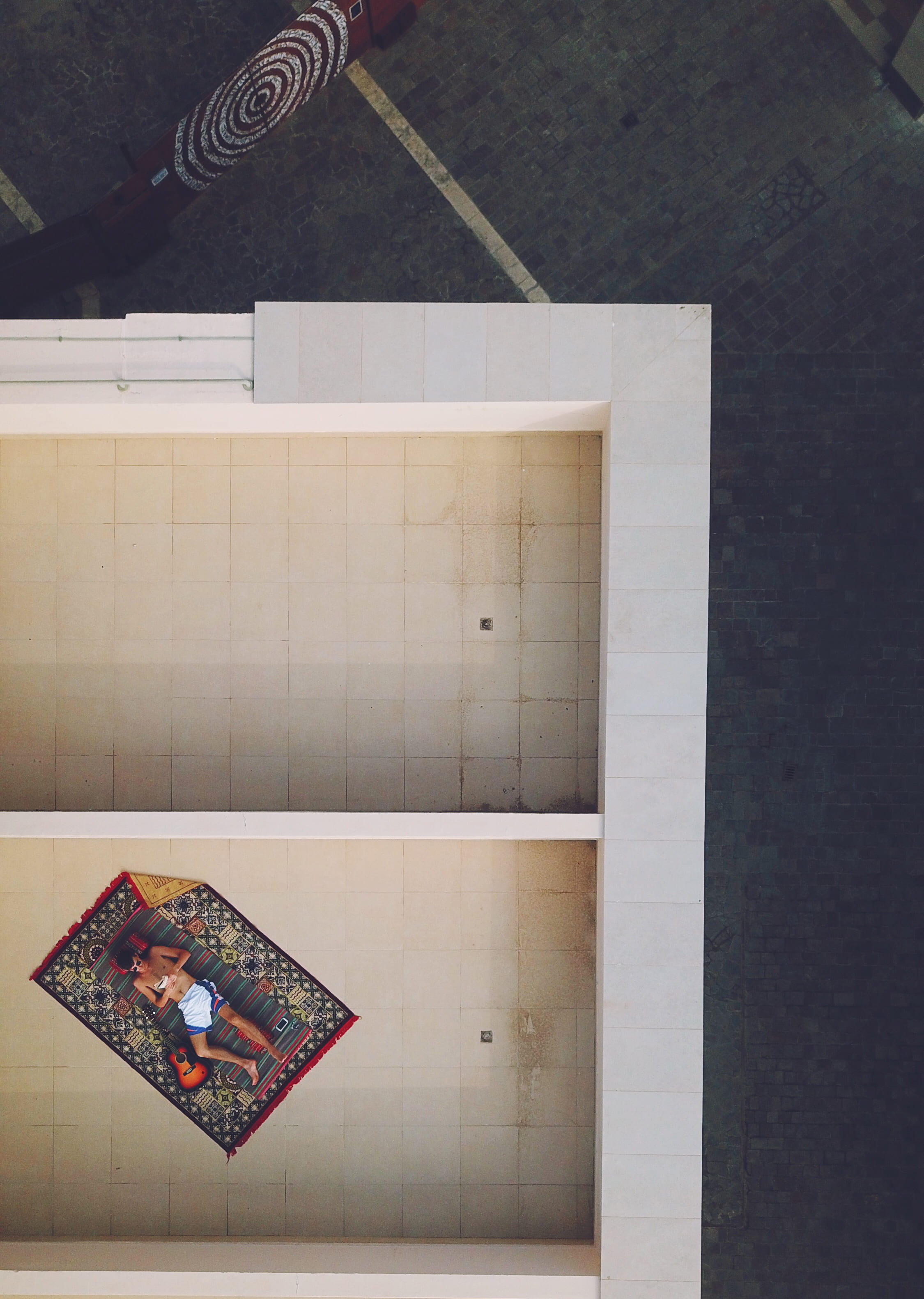 absence, directly above, book, man, multicolored, from above, relaxation, open, balcony, photography, publication, indoors, container, person, tiled floor, Phone HD Wallpaper