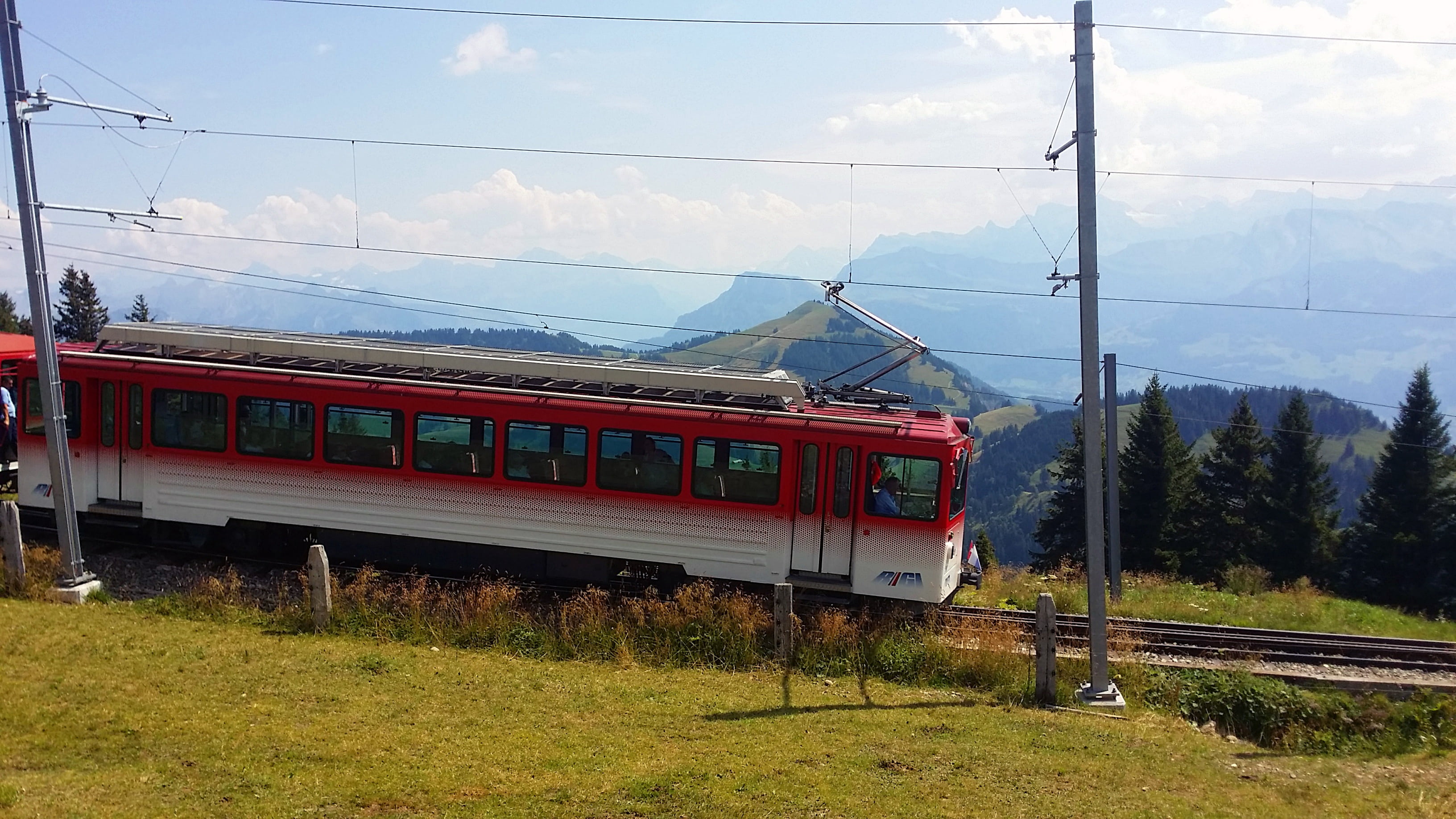 mountain, mode of transportation, track, sky, day, 2K, passenger train, travel, station, public transportation, no people, nature, electricity, mode of Transport, HD Wallpaper