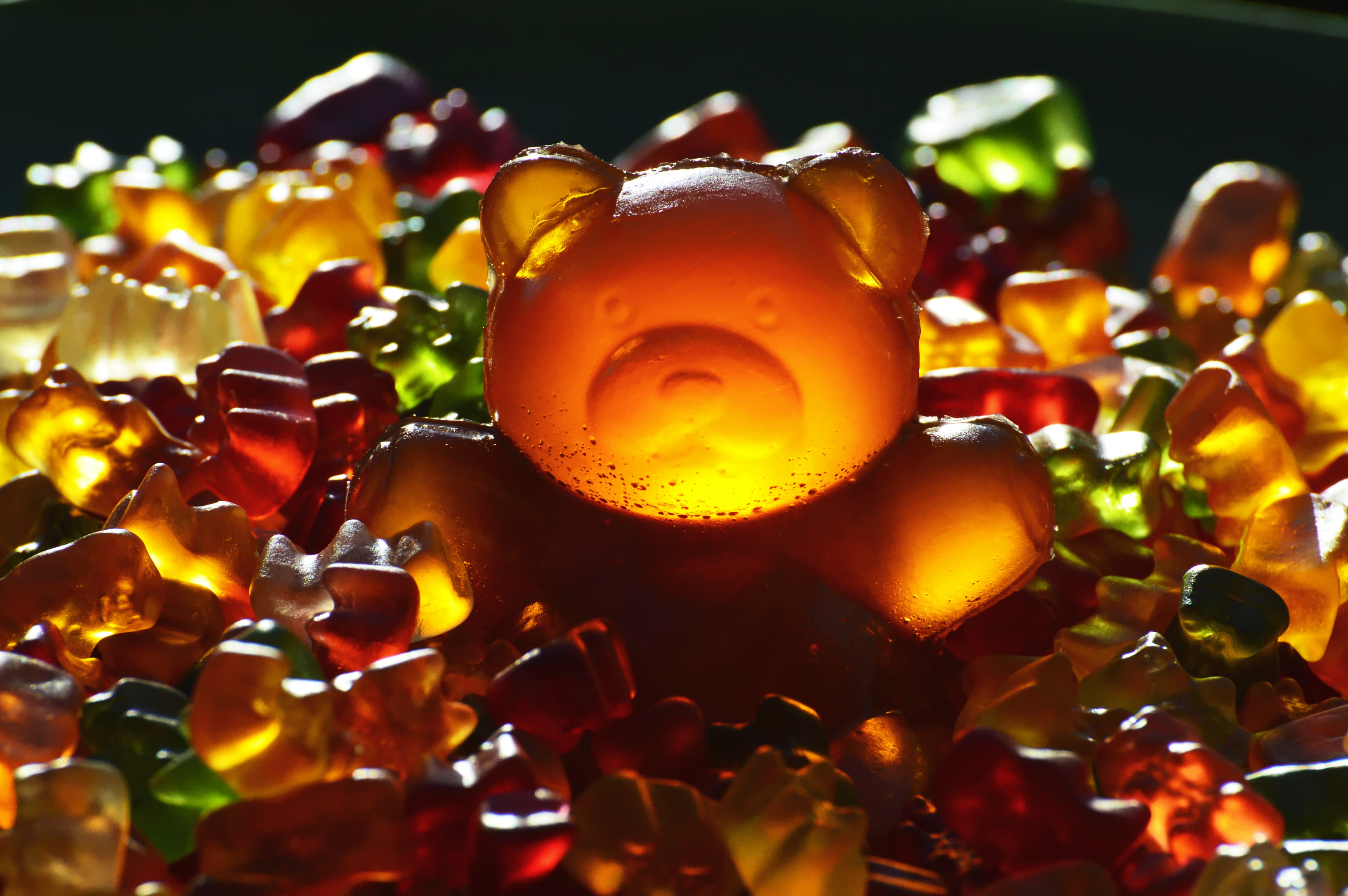 night, selective focus, sweet, food and drink, fruit jelly mix, freshness, brand, wellbeing, 4K, colorful, gummi bears, healthy eating, flame, glowing, HD Wallpaper