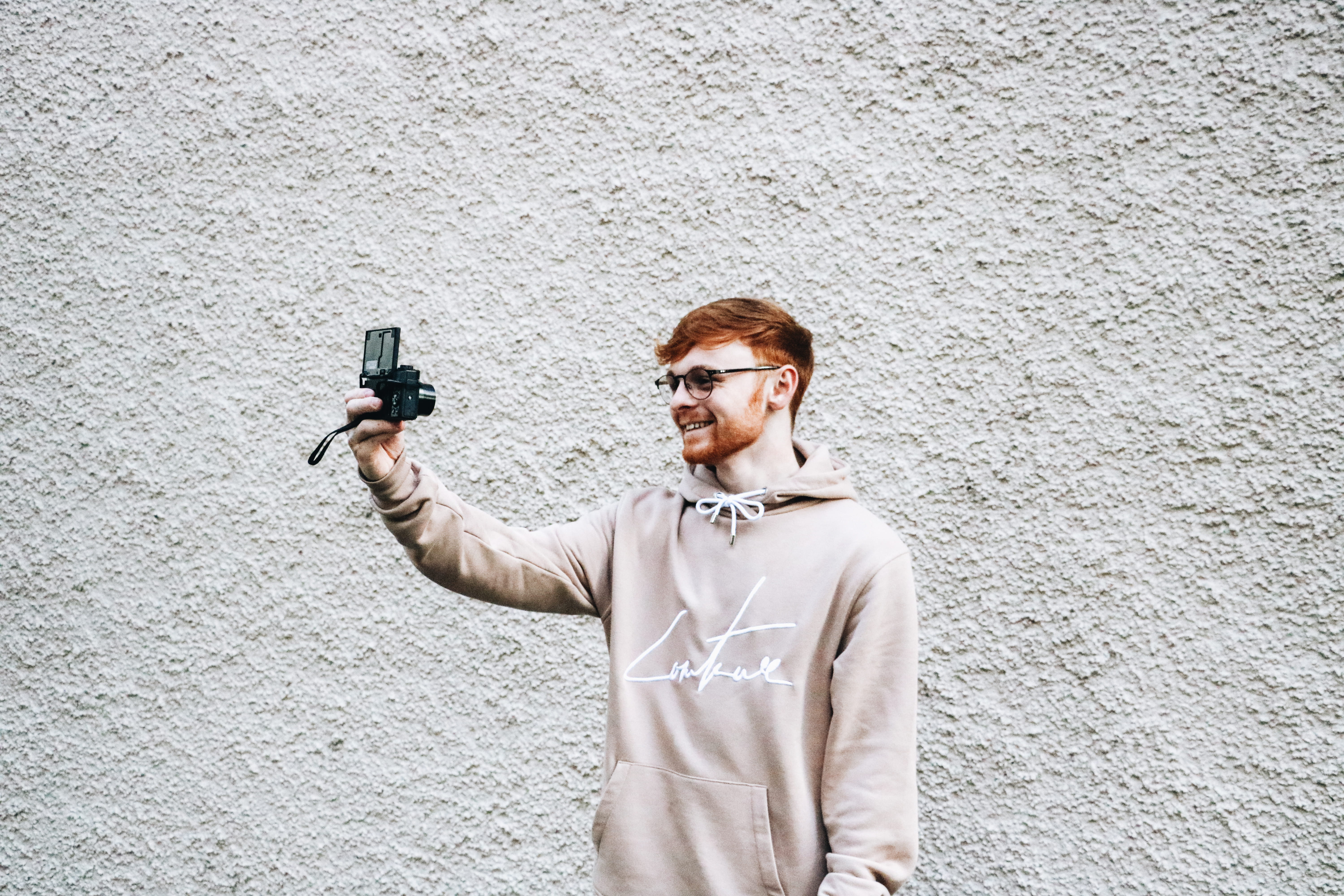 wall - building feature, architecture, person, photo, government, sleeve, wall, photographer, shooting a weapon, gun, taking, front, long sleeve, man, camera, HD Wallpaper