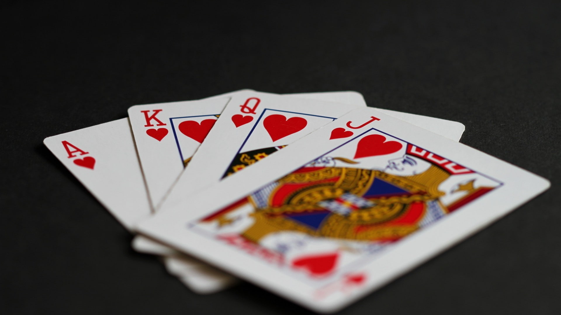 1080P, gambling, cards, winning, leisure activity, close-up, arts culture and entertainment, competition, relaxation, black background, leisure games, HD Wallpaper