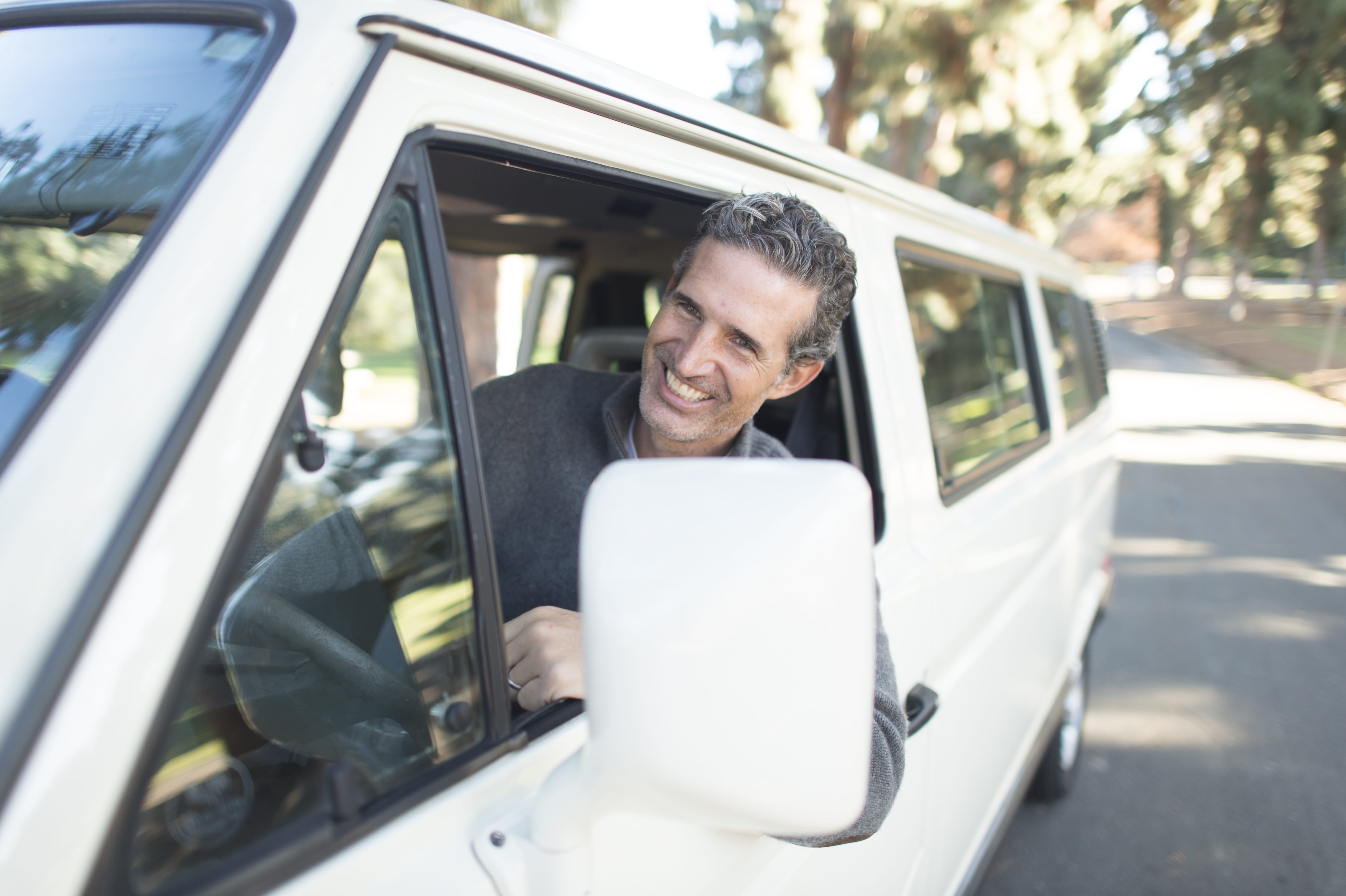 one person, males, leaning, van, headrest, men, land vehicle, lean, business, people, smiling, mature men, sweater, man, home decor, beach wagon, mature adult, HD Wallpaper