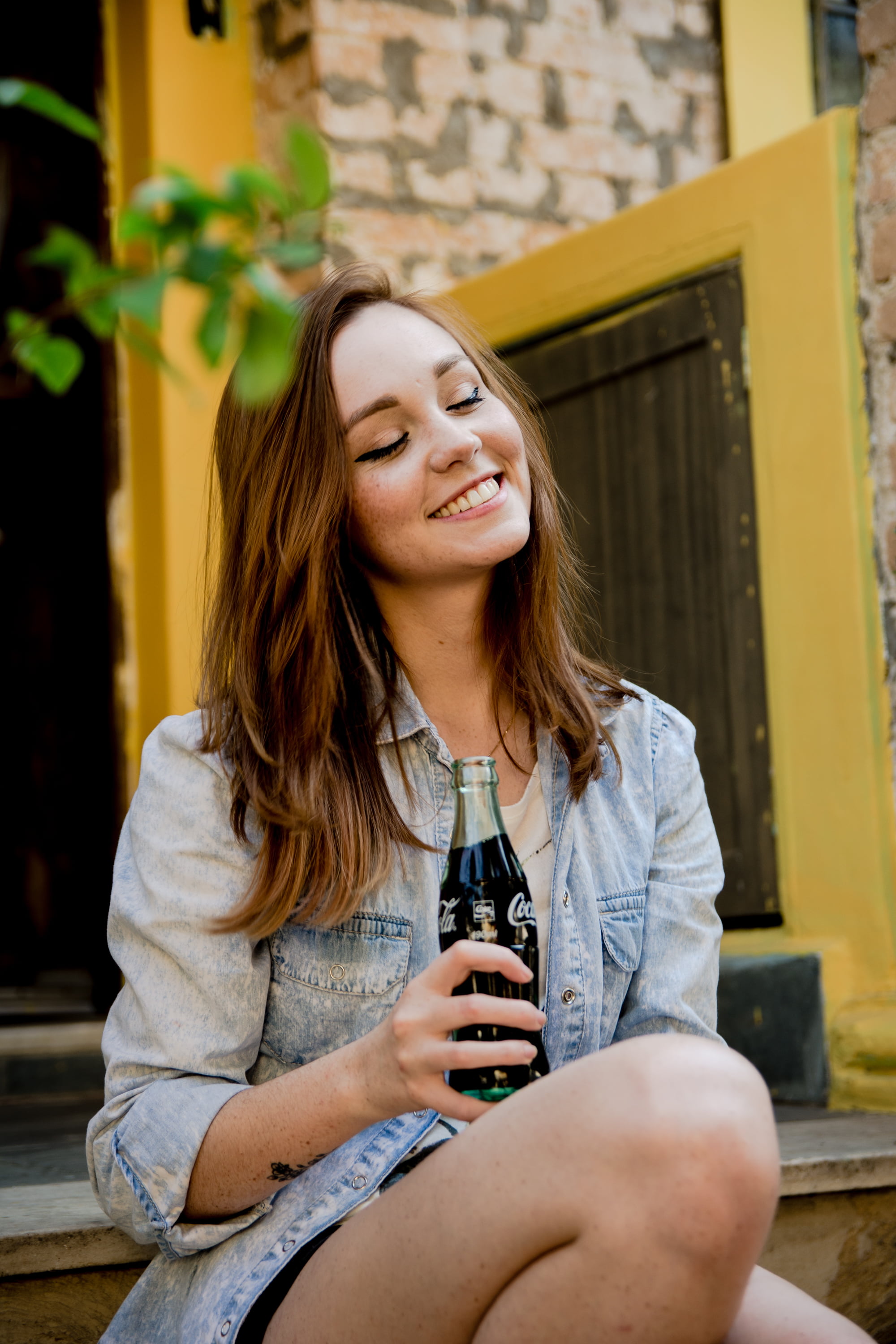 young adult, drink, lifestyles, casual clothing, long hair, closed eyes, outdoors, 2K, jeans jacket, three quarter length, hair, drinking, beautiful woman, Phone HD Wallpaper