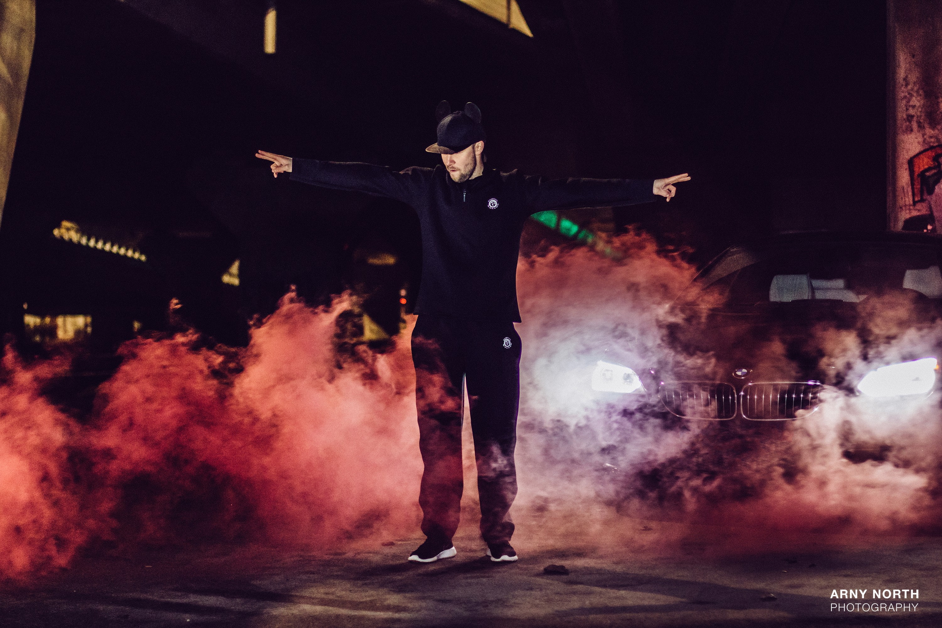 smoke - physical structure, arts culture and entertainment, BMW 650i, arms raised, illuminated, young men, stage - performance space, stage, night, standing, HD Wallpaper