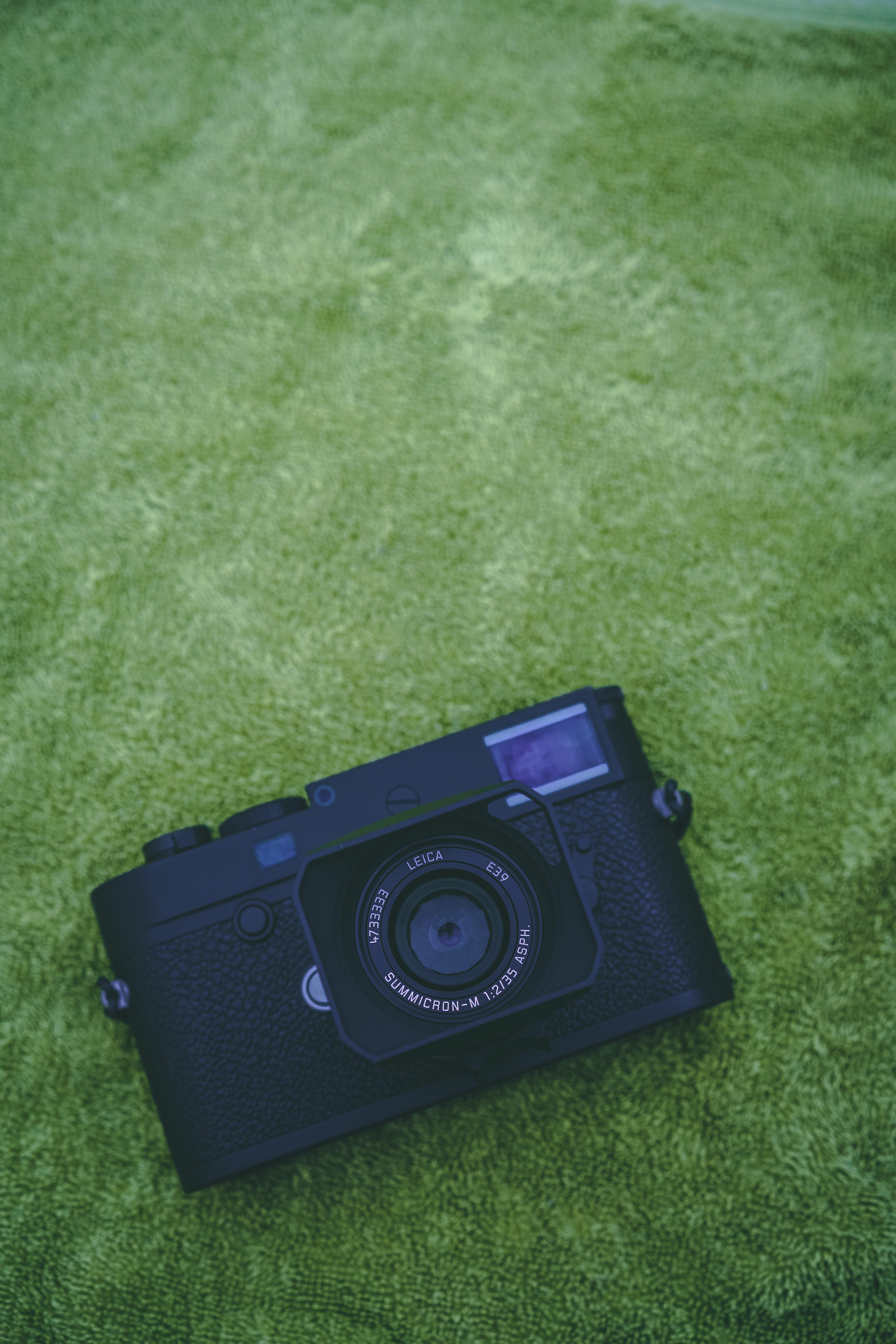 camera, black color, camera - photographic equipment, black, photography themes, 8K, land, strap, close-up, food, no people, grass, still life, lens cap, Phone HD Wallpaper