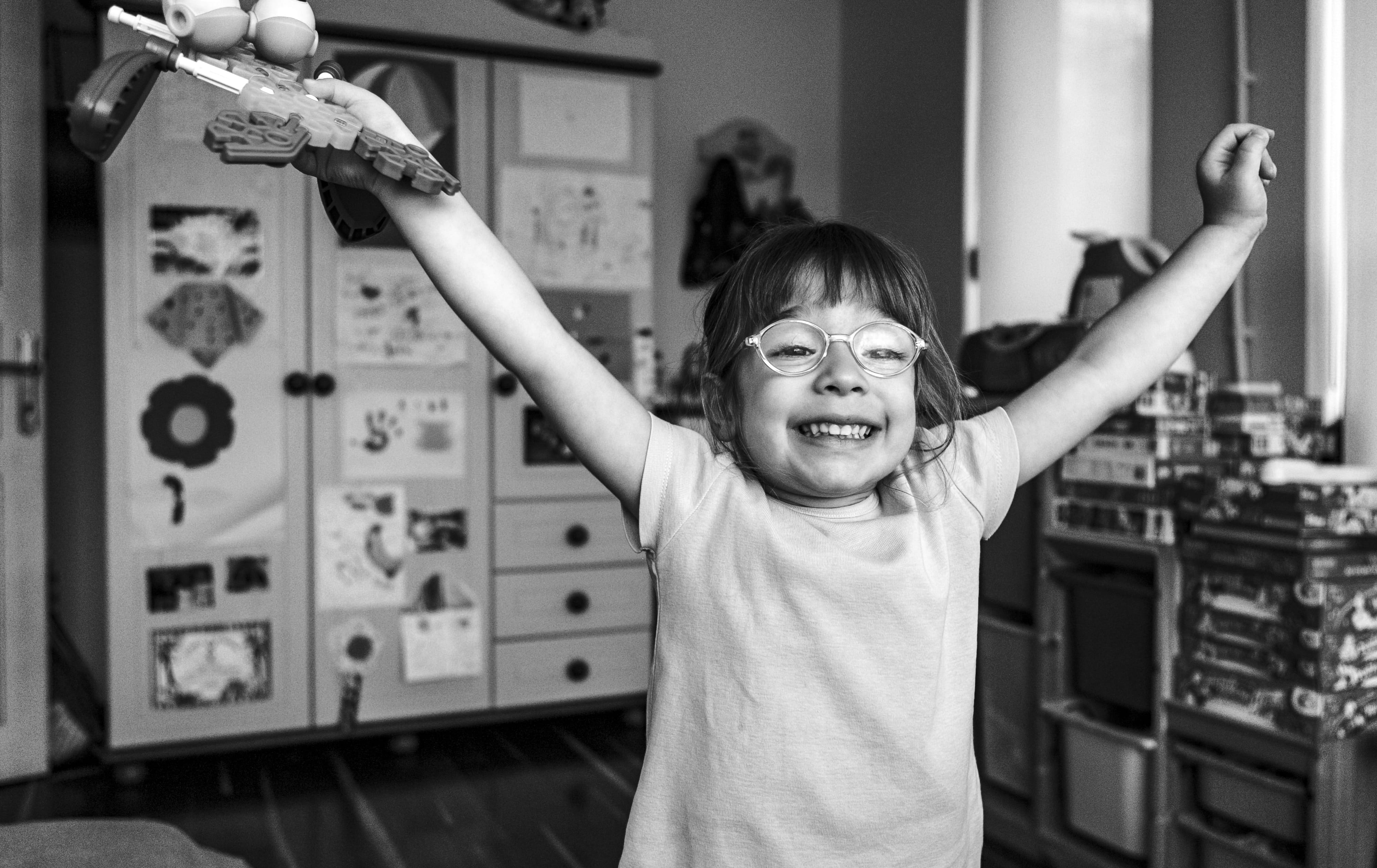 playing, looking at camera, innocence, fun, standing, girl, game, arms raised, hand raised, human arm, portrait, happiness, 4K, one person, joy, child, HD Wallpaper