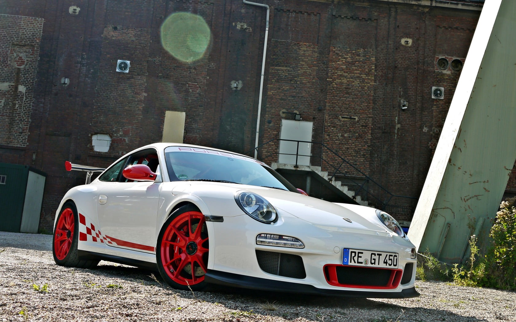 transportation, speed, outdoors, porsche, no people, 720P, wheel, auto racing, germany, red, sports Race, built structure, sports Car, land Vehicle, mode of transportation, HD Wallpaper