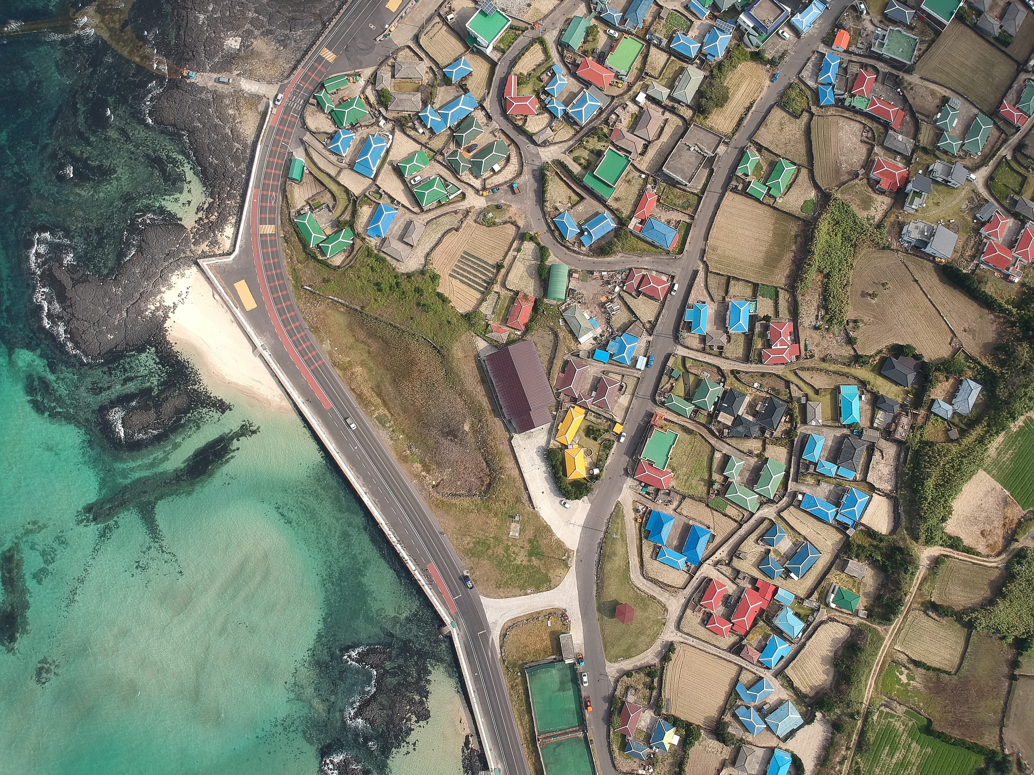 large group of objects, yellow, flying, red, 4K, roof, swimming pool, drone, turquoise colored, road, aerial view, jeju, built structure, town, water, HD Wallpaper