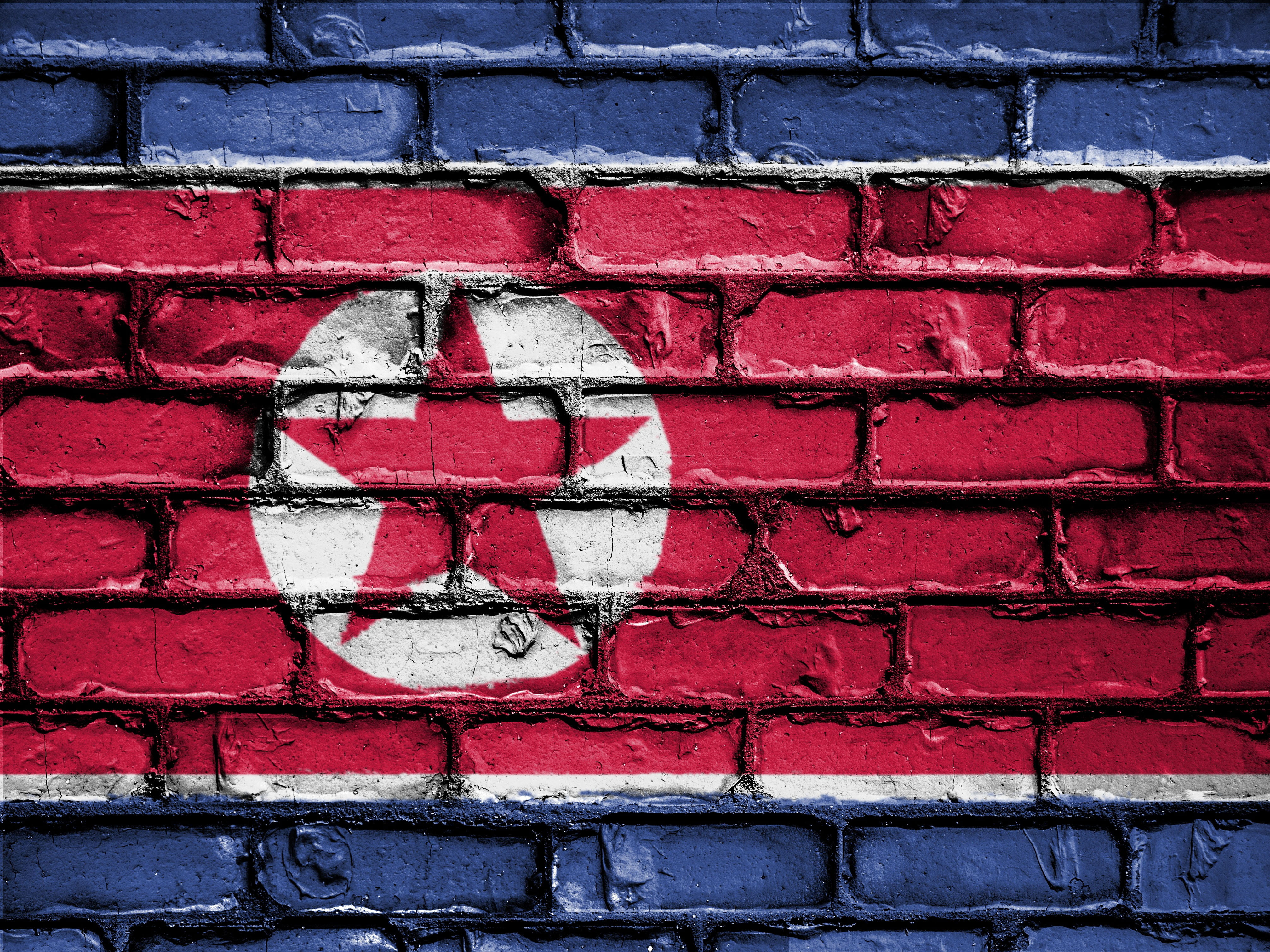 korea, 4K, brick, architecture, brick wall, full frame, art and craft, textured, wall, daytime, communication, flag, building exterior, north korea, built structure, HD Wallpaper