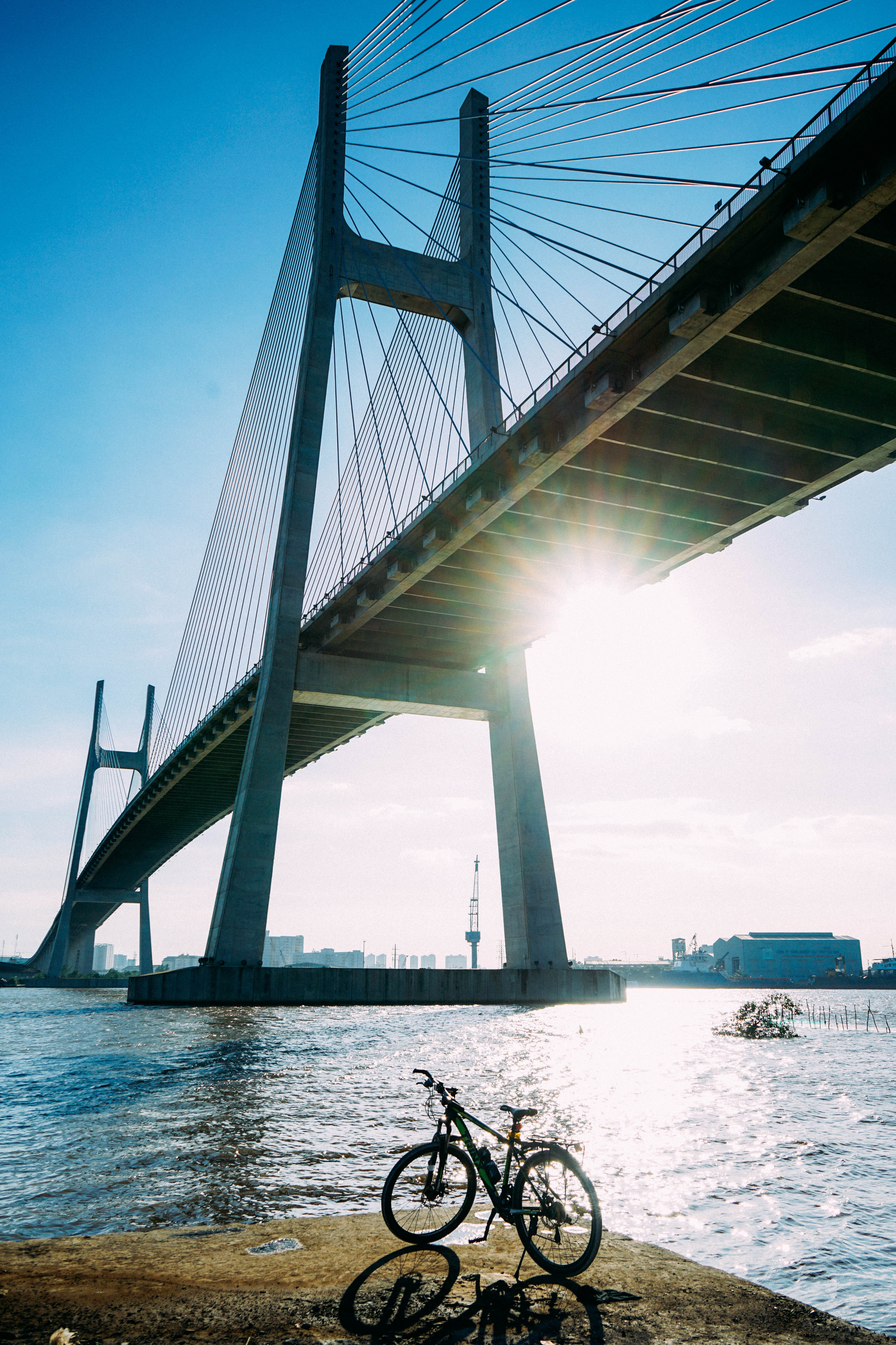 phu my bridge, nature, connection, river, landscape, bike, engineering, vietnam, sunlight, hochiminh, street, outdoors, city, built structure, bicycle, Phone HD Wallpaper