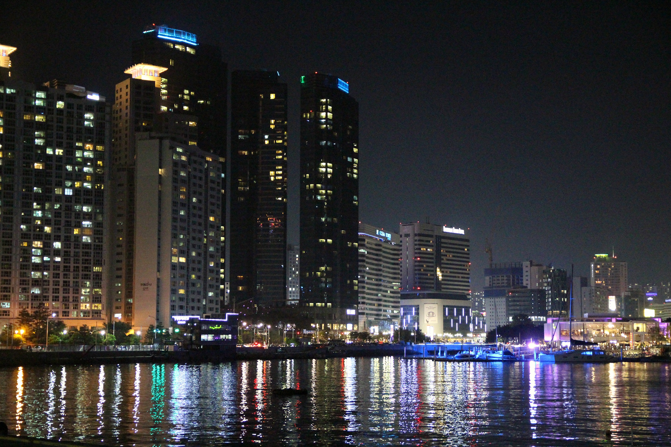 night, financial district, cityscape, built structure, water, 2K, reflection, gwangalli, busan, rise, buildings, building, building exterior, gray, outdoors, HD Wallpaper