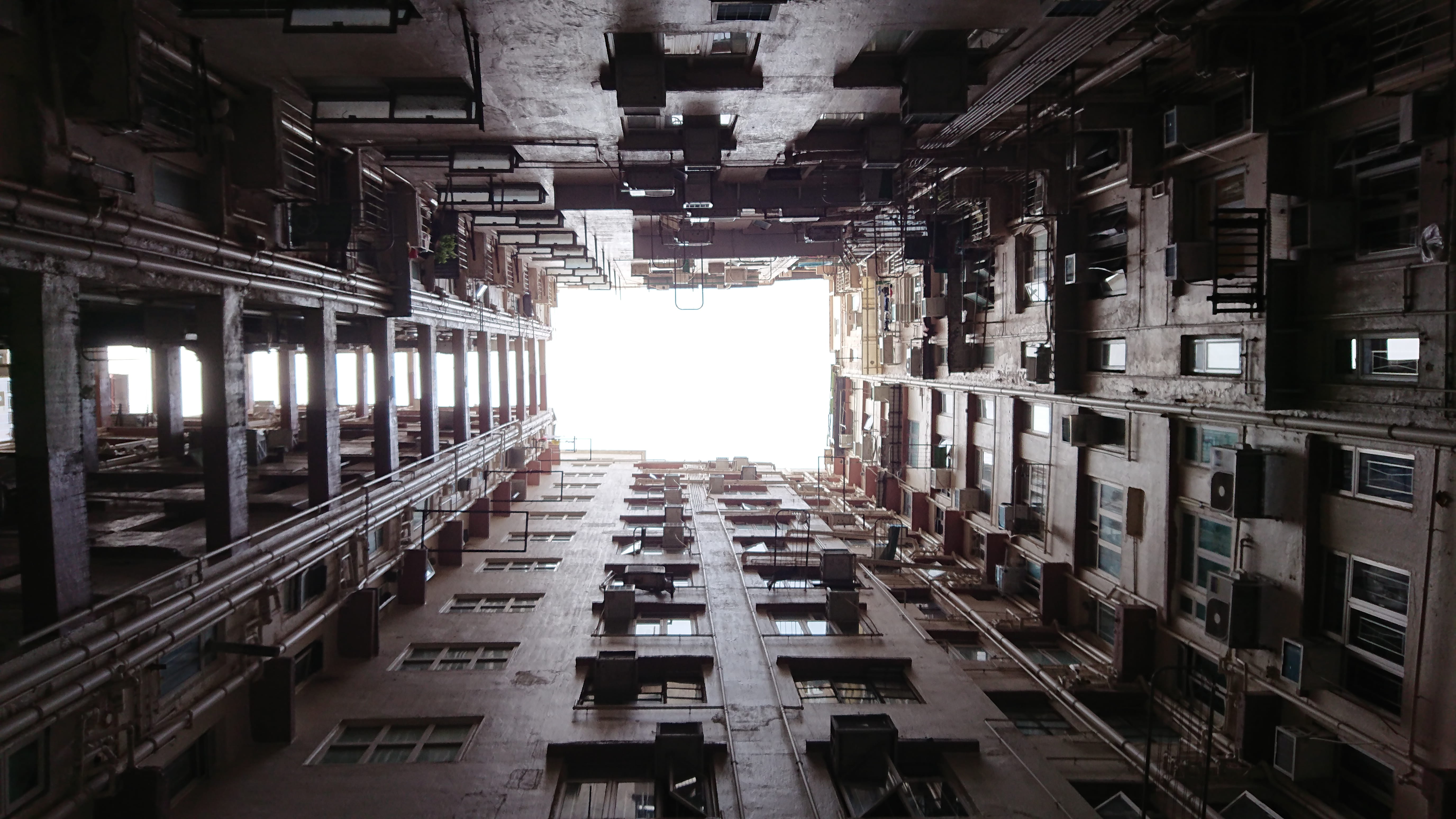 no people, urban, day, 5K, warehouse, nature, tsim sha tsui, outdoors, directly below, architecture, built structure, building exterior, building, symmetry, HD Wallpaper