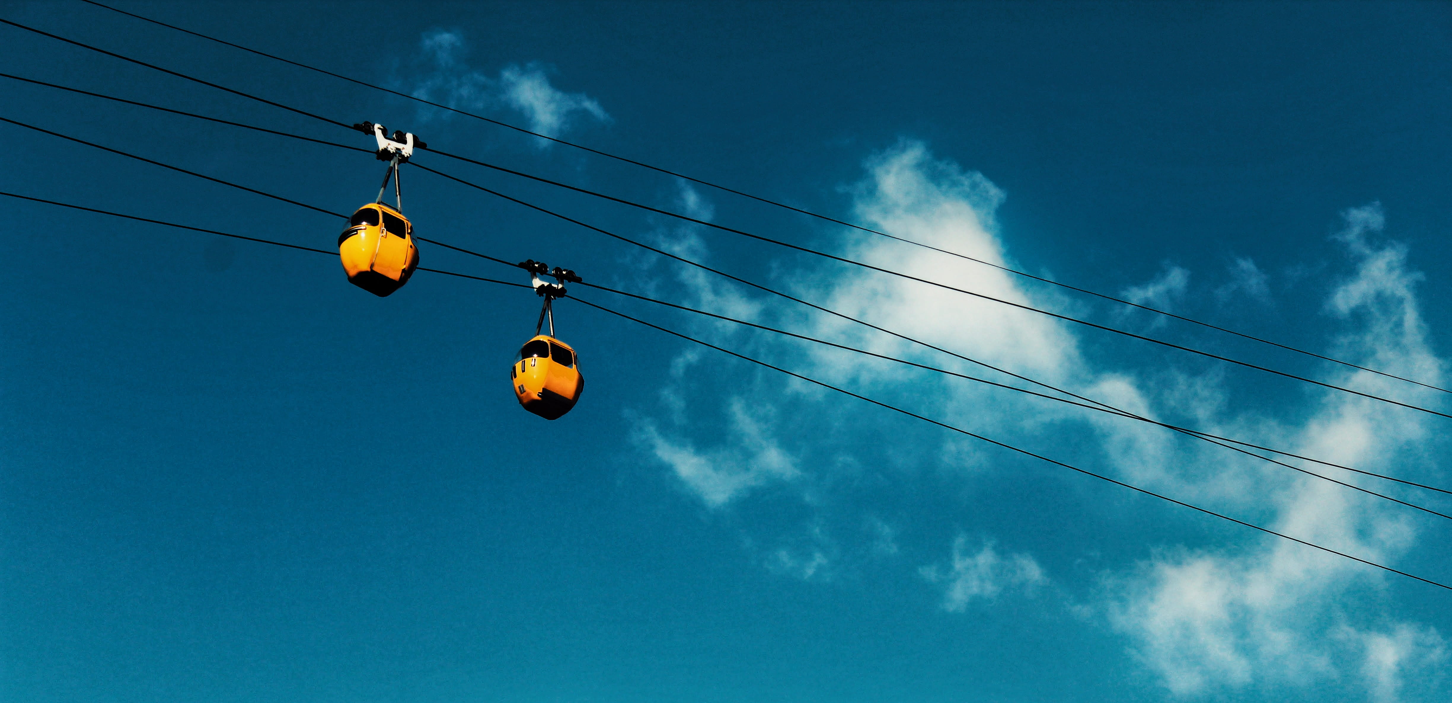 celebration, sky, lighting equipment, two, cable, cars, blue sky, no people, transportation, yellow, connection, time, cable car, cloud - sky, hanging, HD Wallpaper