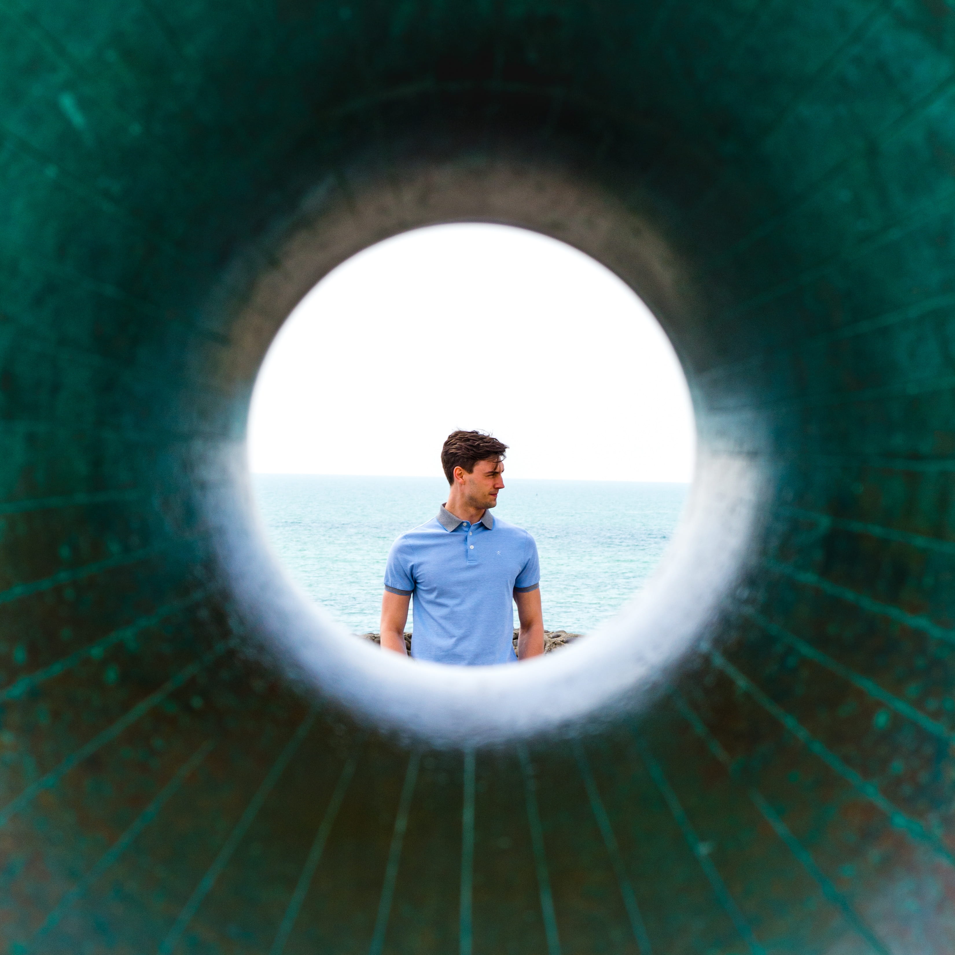 daytime, standing, blue, day, sitting, architecture, man, nature, mid adult, shirt, man in blue, looking at view, lifestyles, real people, men, distance, Phone HD Wallpaper