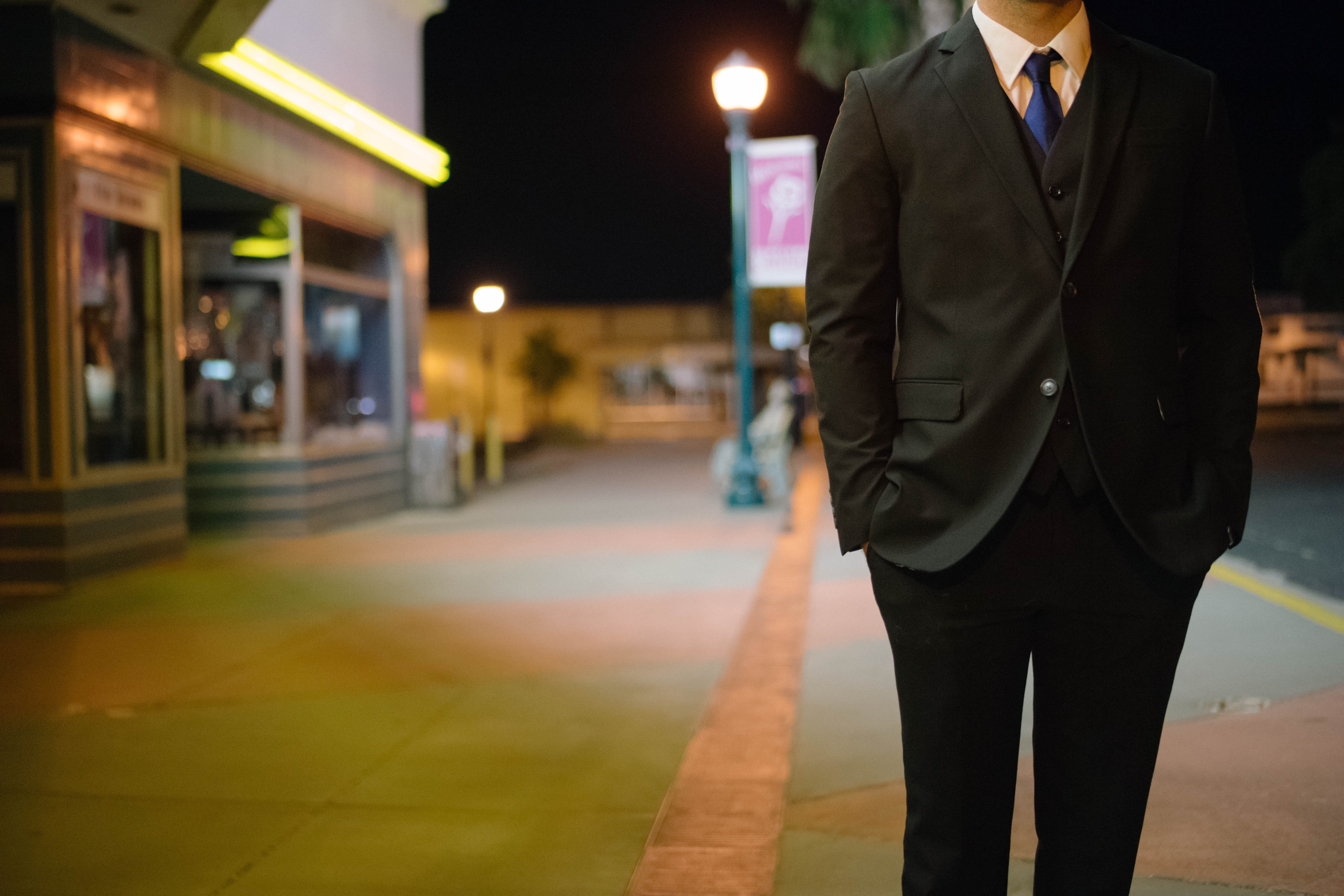 putting, guy, one person, waiting, building exterior, shopfront, man, transportation, overcoat, business, night, city life, outdoors, illuminated, pavement, HD Wallpaper