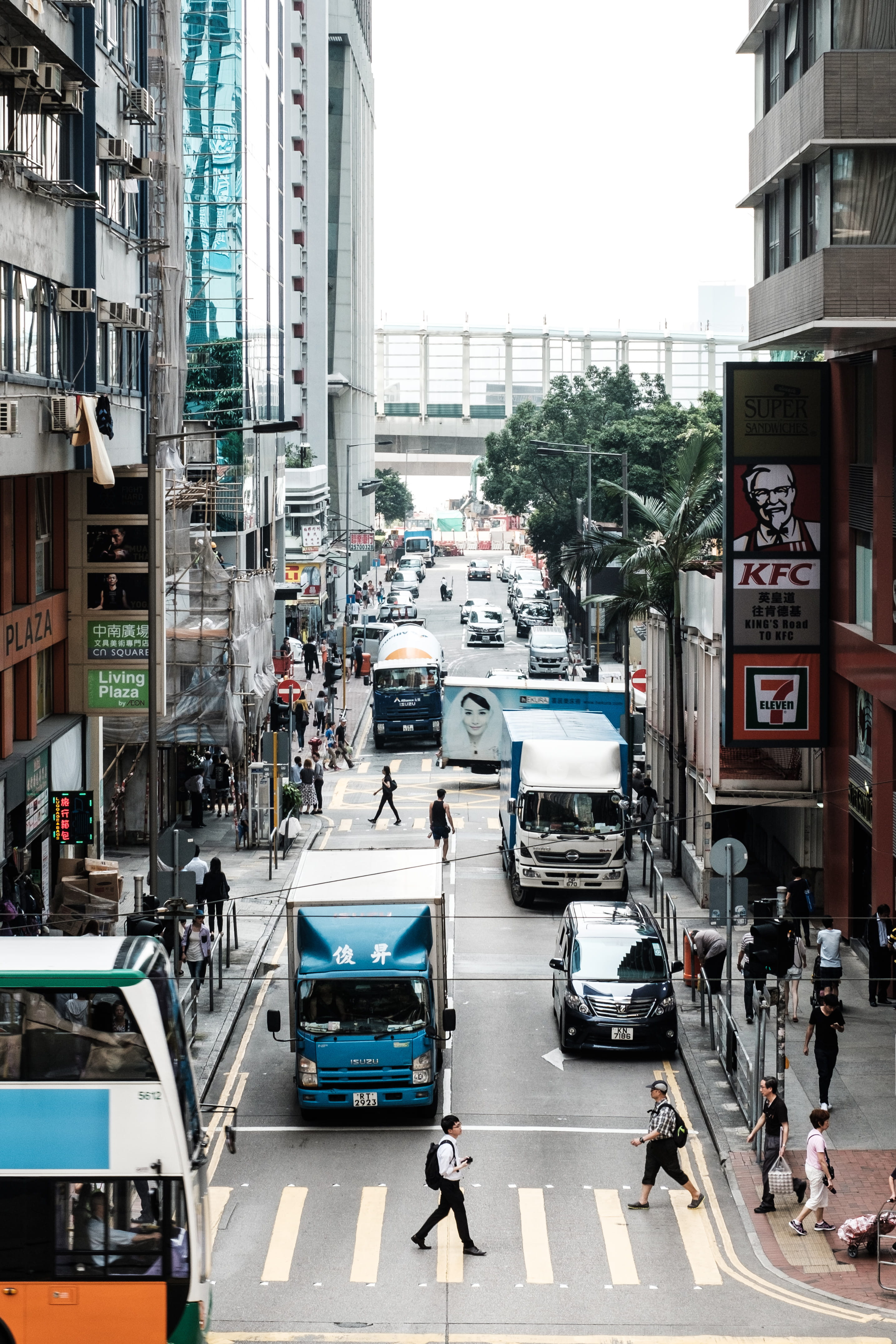 city life, building exterior, cityscape, small, people, sign, crossing, mode of transportation, hong kong, street, incidental people, traffic, outdoors, Phone HD Wallpaper