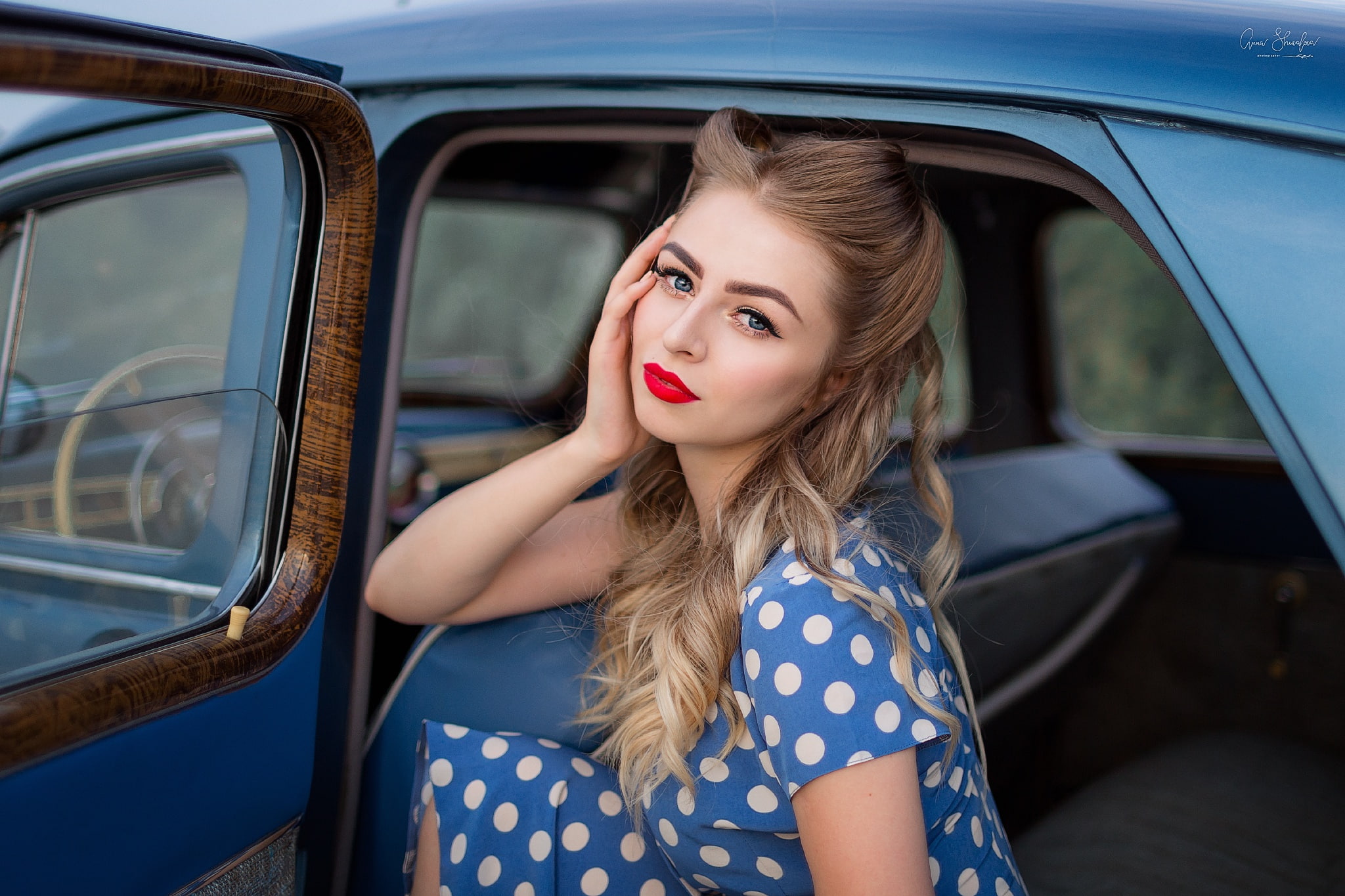 inside a car, beauty, hairstyle, women with cars, hand on face, blue eyes, red lipstick, touching face, one person, car interior, real people, portrait, HD Wallpaper